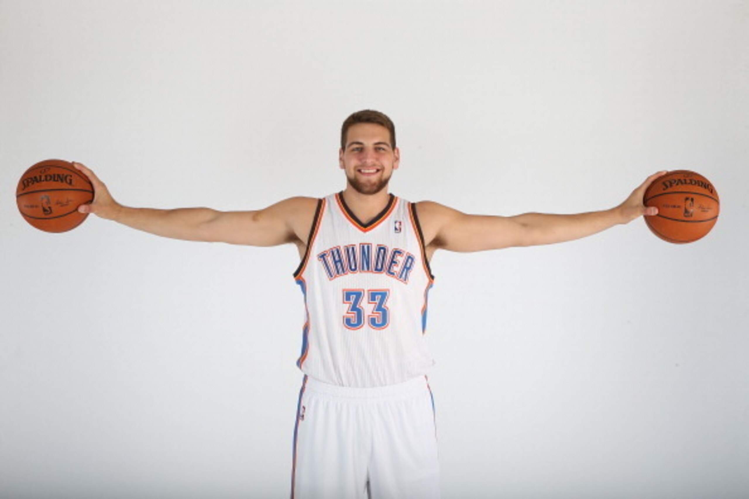 OKLAHOMA CITY, OK - JUNE 27: Mitch McGary an Oklahoma City Thunder draft pick poses for a portrait during a 2014 NBA shoot on June 27, 2014 at the Oklahoma History Center in Oklahoma City, Oklahoma. NOTE TO USER: User expressly acknowledges and agrees t OKLAHOMA CITY, OK - JUNE 27: Mitch McGary an Oklahoma City Thunder draft pick poses for a portrait during a 2014 NBA shoot on June 27, 2014 at the Oklahoma History Center in Oklahoma City, Oklahoma. NOTE TO USER: User expressly acknowledges and agrees t