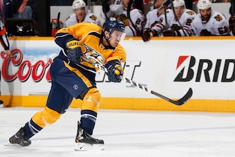 NASHVILLE, TN - APRIL 12: Michael Del Zotto #5 of the Nashville Predators takes a slapshot against the Chicago Blackhawks during an NHL game at Bridgestone Arena on April 12, 2014 in Nashville, Tennessee. (Photo by John Russell/NHLI via Getty Images)