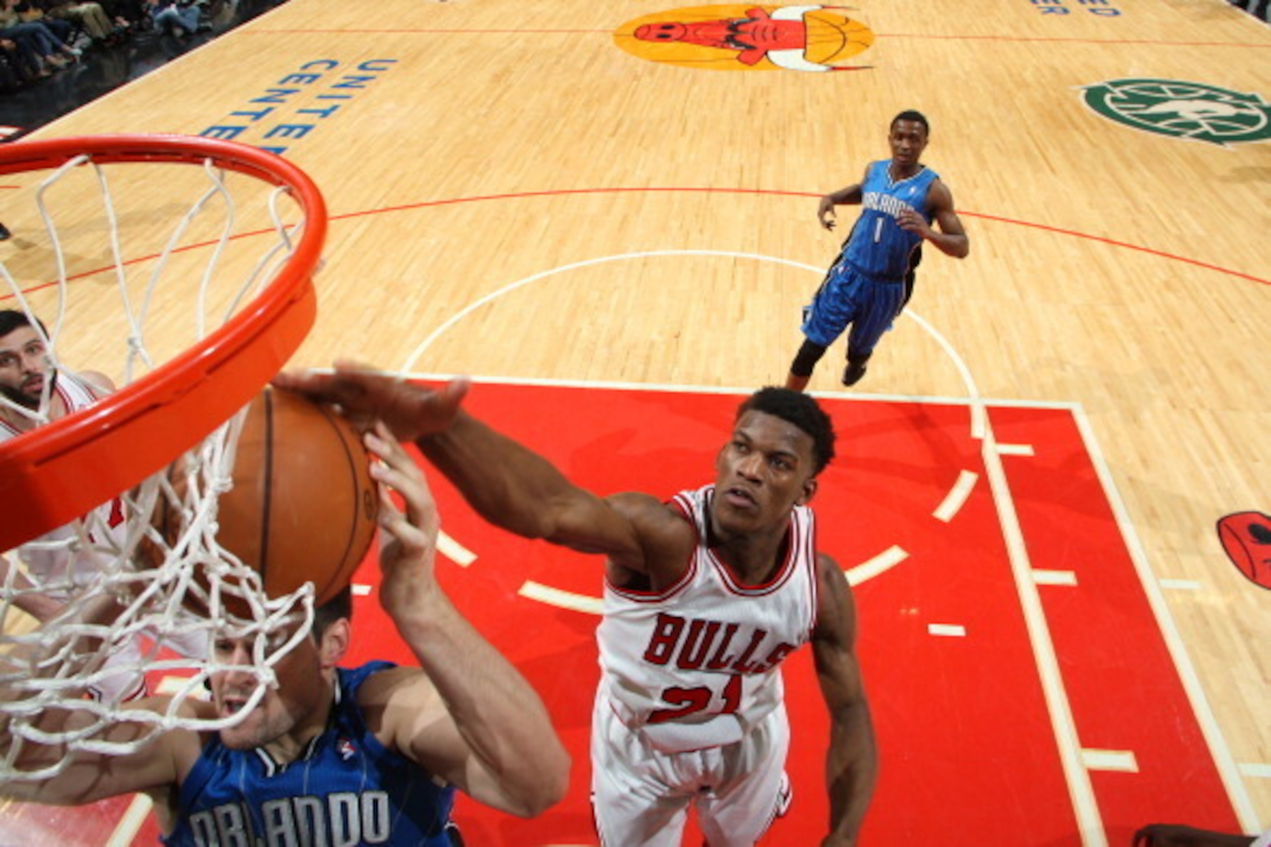 CHICAGO, IL - APRIL 5: Jimmy Butler #21 of the Chicago Bulls blocks the shot of an Orlando Magic player on April 05, 2013 at the United Center in Chicago, Illinois. NOTE TO USER: User expressly acknowledges and agrees that, by downloading and or using CHICAGO, IL - APRIL 5: Jimmy Butler #21 of the Chicago Bulls blocks the shot of an Orlando Magic player on April 05, 2013 at the United Center in Chicago, Illinois. NOTE TO USER: User expressly acknowledges and agrees that, by downloading and or using