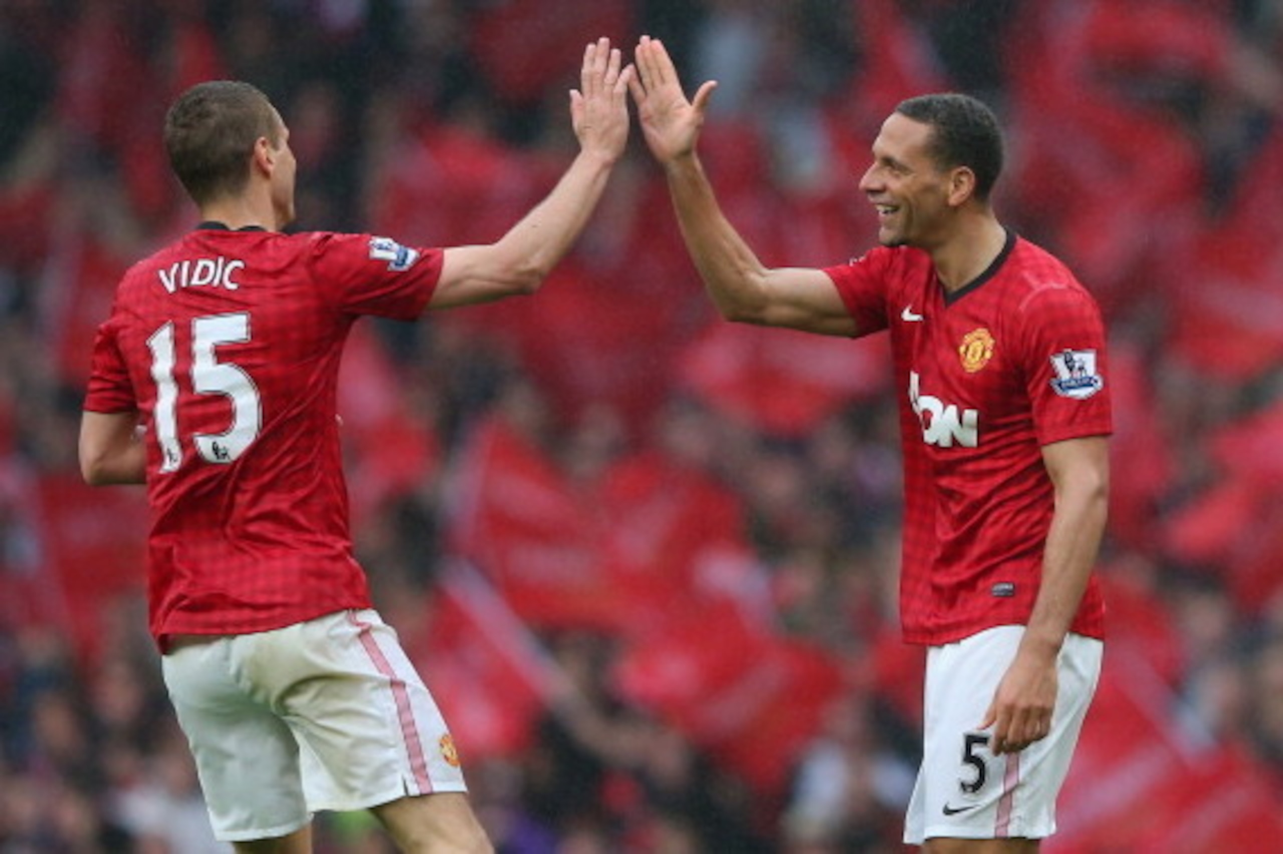 MANCHESTER, ENGLAND - MAY 12: Rio Ferdinand of Manchester United celebrates scoring the winning goal with team-mate Nemanja Vidic during the Barclays Premier League match between Manchester United and Swansea City at Old Trafford on May 12, 2013 in Manch MANCHESTER, ENGLAND - MAY 12: Rio Ferdinand of Manchester United celebrates scoring the winning goal with team-mate Nemanja Vidic during the Barclays Premier League match between Manchester United and Swansea City at Old Trafford on May 12, 2013 in Manch