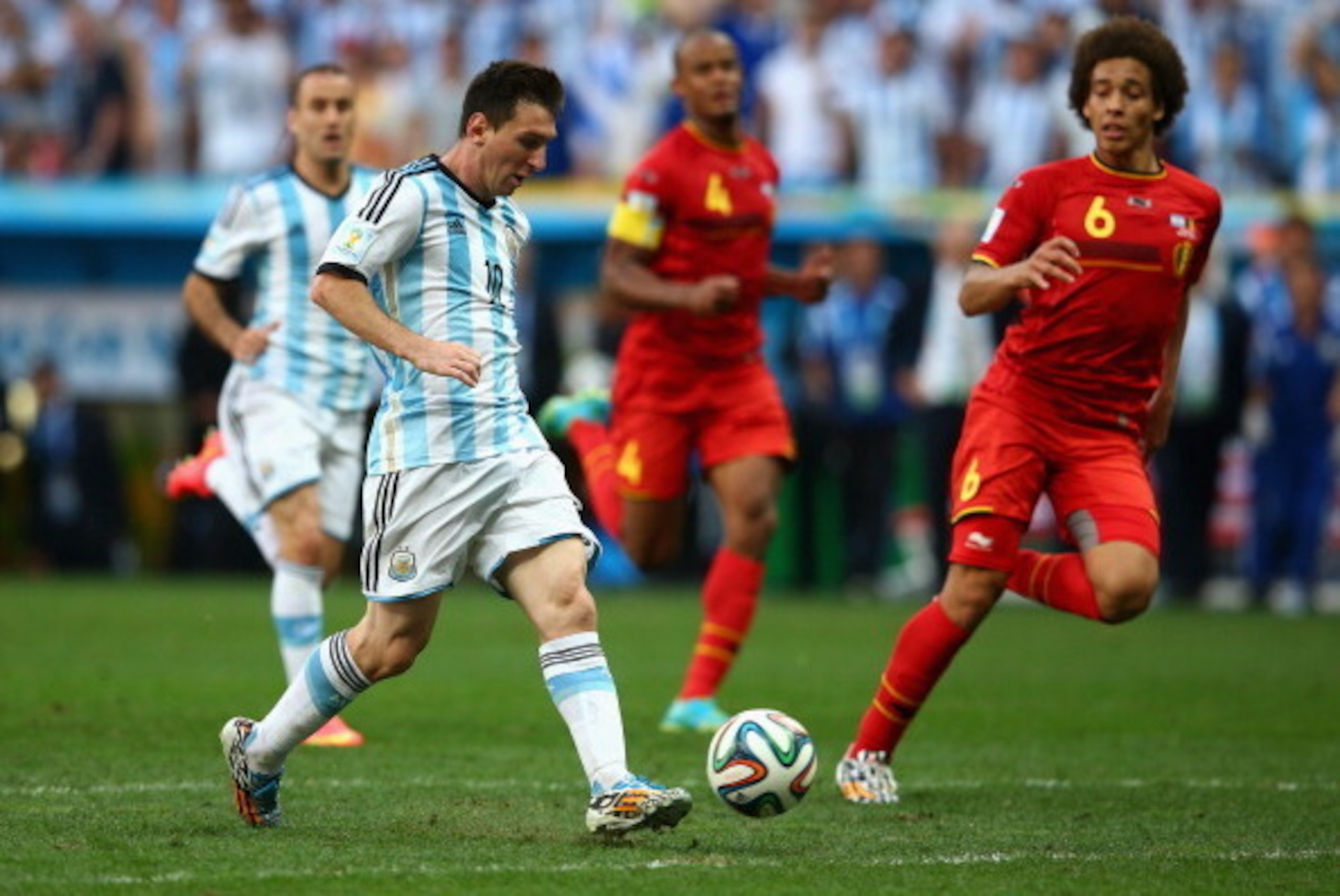 BRASILIA, BRAZIL - JULY 05:  Lionel Messi of Argentina attempts to chip the keeper during the 2014 FIFA World Cup Brazil Quarter Final match between Argentina and Belgium at Estadio Nacional on July 5, 2014 in Brasilia, Brazil.  (Photo by Julian Finney/Ge