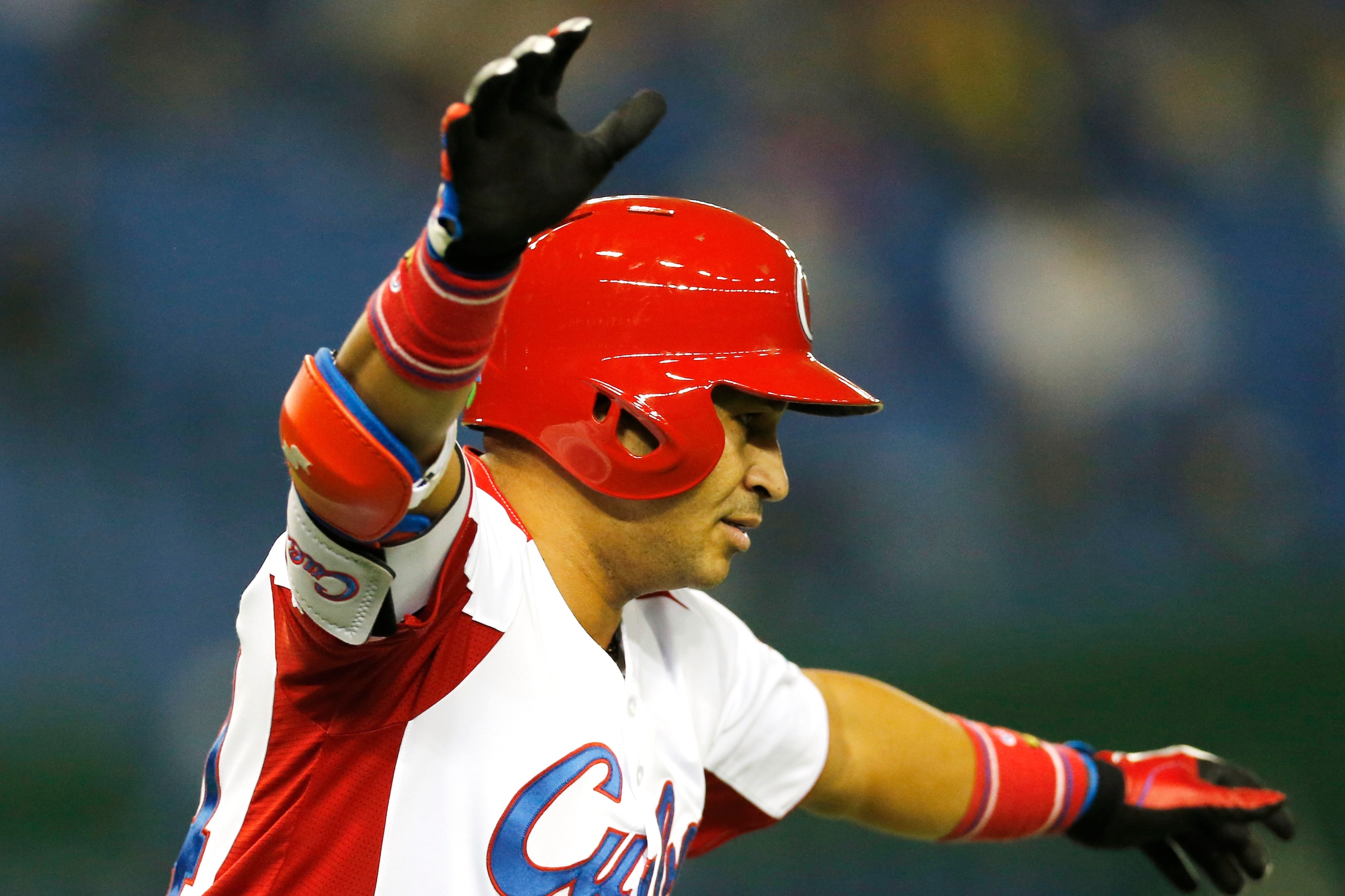 Frederich Cepeda celebrates a hit in 2013 World Baseball Classic.