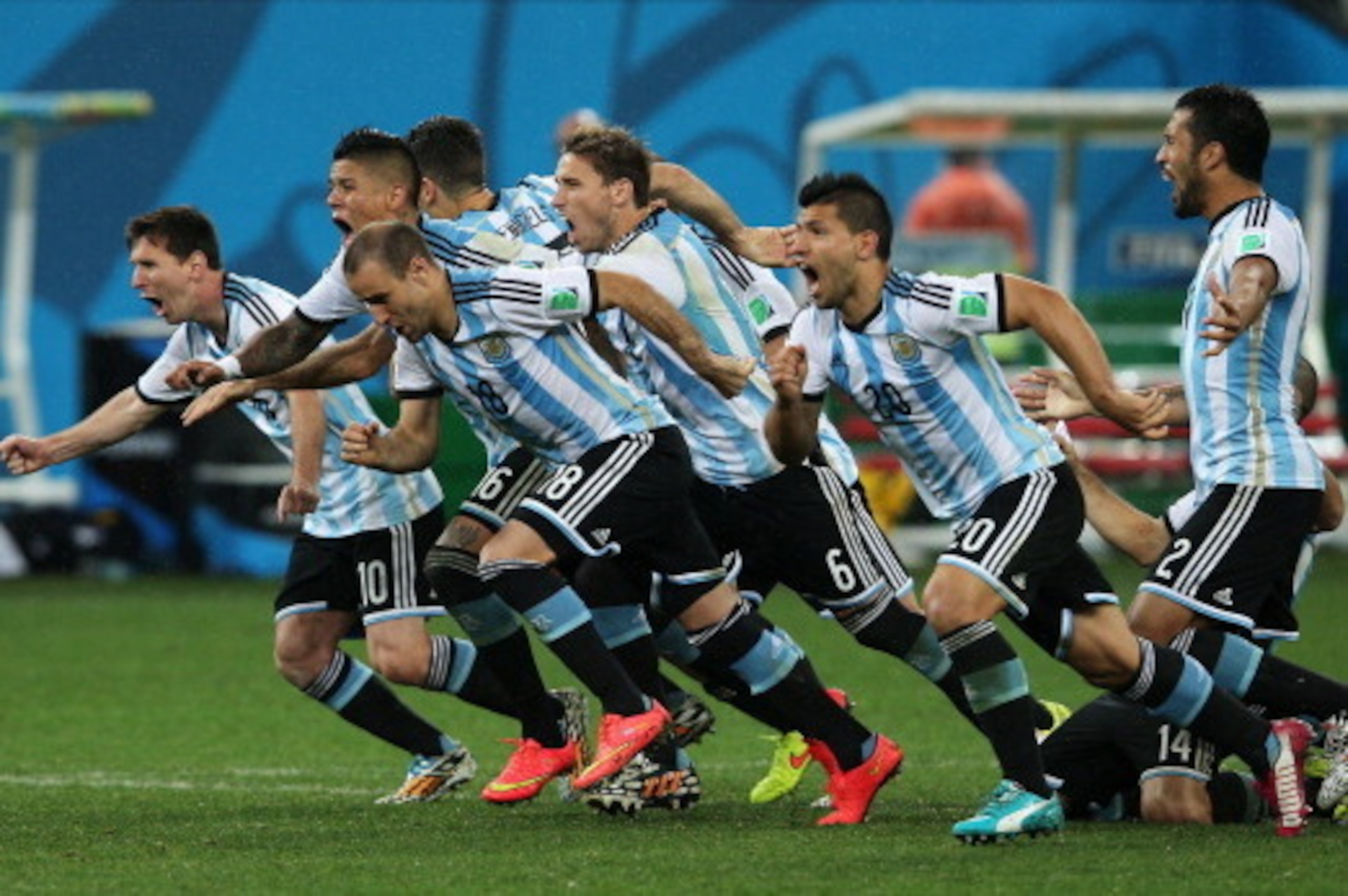 SAO PAULO, BRAZIL - JULY 09: Lionel Messi, Pablo Zabaleta, Martin Demichelis, Marcos Rojo, Lucas Biglia, Javier Mascherano, Rodrigo Palacio, Ezequiel Garay and Sergio Aguero of Argentina celebrate defeating the Netherlands in a penalty shootout during th SAO PAULO, BRAZIL - JULY 09: Lionel Messi, Pablo Zabaleta, Martin Demichelis, Marcos Rojo, Lucas Biglia, Javier Mascherano, Rodrigo Palacio, Ezequiel Garay and Sergio Aguero of Argentina celebrate defeating the Netherlands in a penalty shootout during th