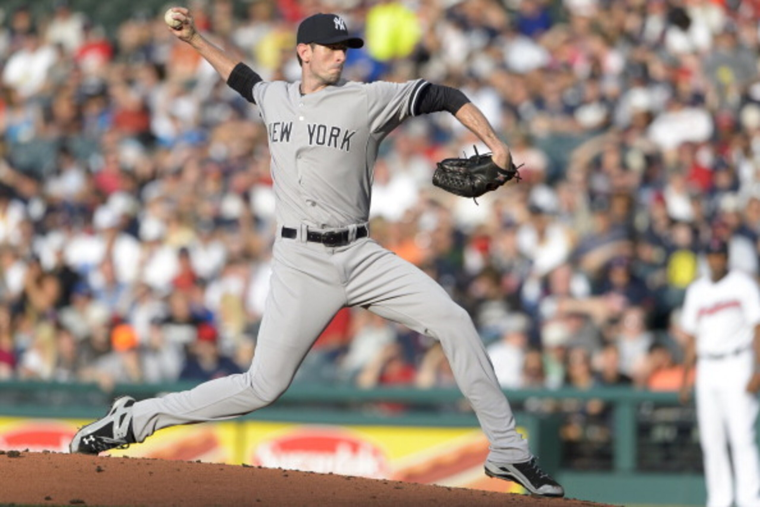 CLEVELAND, OH - JULY 9: Starter Brandon McCarthy #38 of the New York Yankees pitches during the first inning against the Cleveland Indians at Progressive Field on July 9, 2014 in Cleveland, Ohio. (Photo by Jason Miller/Getty Images)
