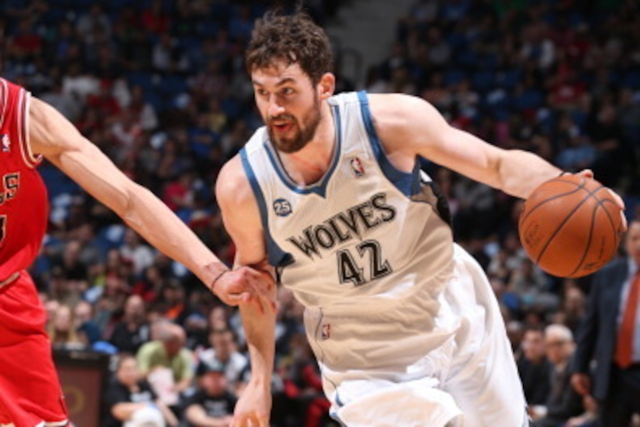 MINNEAPOLIS, MN - April 9: Kevin Love #42 of the Minnesota Timberwolves handles the ball against the Chicago Bulls during the game on April 9, 2014 at Target Center in Minneapolis, Minnesota. NOTE TO USER: User expressly acknowledges and agrees that, by d MINNEAPOLIS, MN - April 9: Kevin Love #42 of the Minnesota Timberwolves handles the ball against the Chicago Bulls during the game on April 9, 2014 at Target Center in Minneapolis, Minnesota. NOTE TO USER: User expressly acknowledges and agrees that, by d