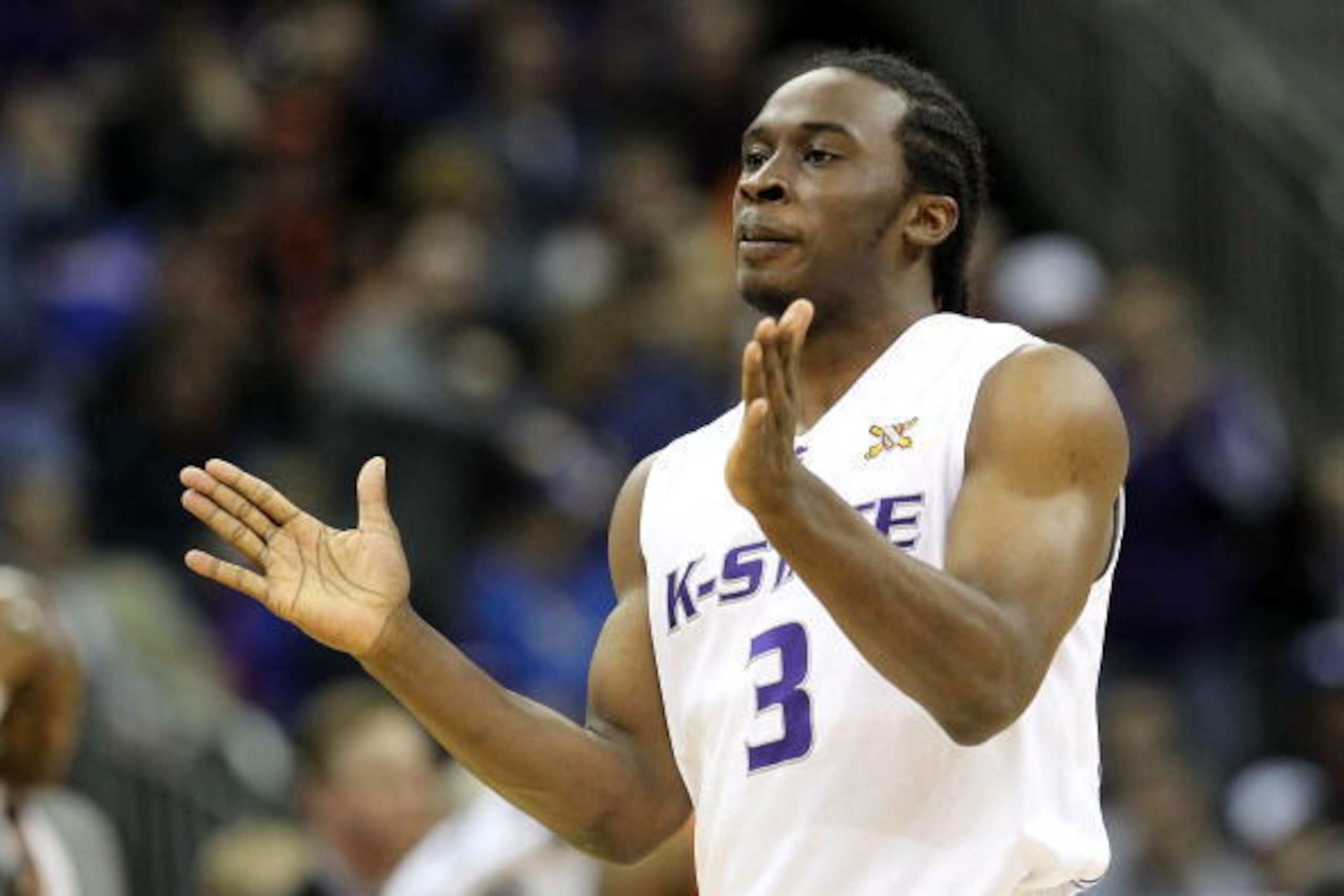 KANSAS CITY, MO - MARCH 11:  Martavious Irving #3 of the Kansas State Wildcats reacts in the first half during the quarterfinals of the 2010 Phillips 66 Big 12 Men's Basketball Tournament against the Oklahoma State Cowboys at the Sprint Center on March 11