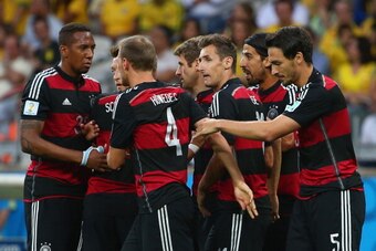 BELO HORIZONTE, BRAZIL - JULY 08:  Thomas Mueller (C) of Germany celebrates with his team-mates after scoring the opening goal during the 2014 FIFA World Cup Brazil Semi Final match between Brazil and Germany at Estadio Mineirao on July 8, 2014 in Belo Ho