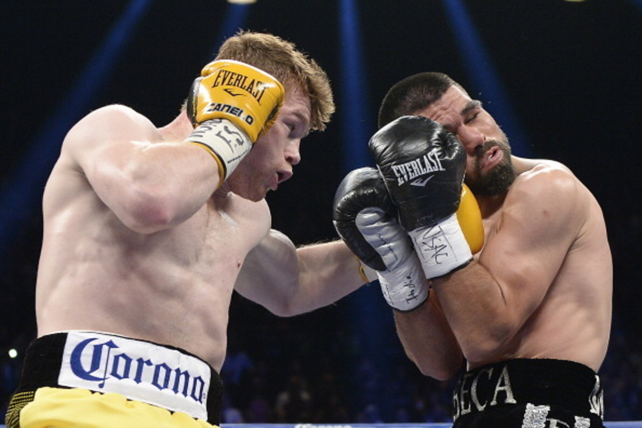 LAS VEGAS, NV - MARCH 8: Canelo Alvarez throws a punch against Alfredo Angulo during their non-title, 12-round super welterweight bout at the MGM Grand Garden March 8, 2014, in Las Vegas, Nevada. (Photo by Kevork Djansezian/Getty Images)