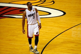 MIAMI, FL - JUNE 12: Dwyane Wade #3 of the Miami Heat looks on against the San Antonio Spurs during Game Four of the 2014 NBA Finals at American Airlines Arena on June 12, 2014 in Miami, Florida. NOTE TO USER: User expressly acknowledges and agrees that, 