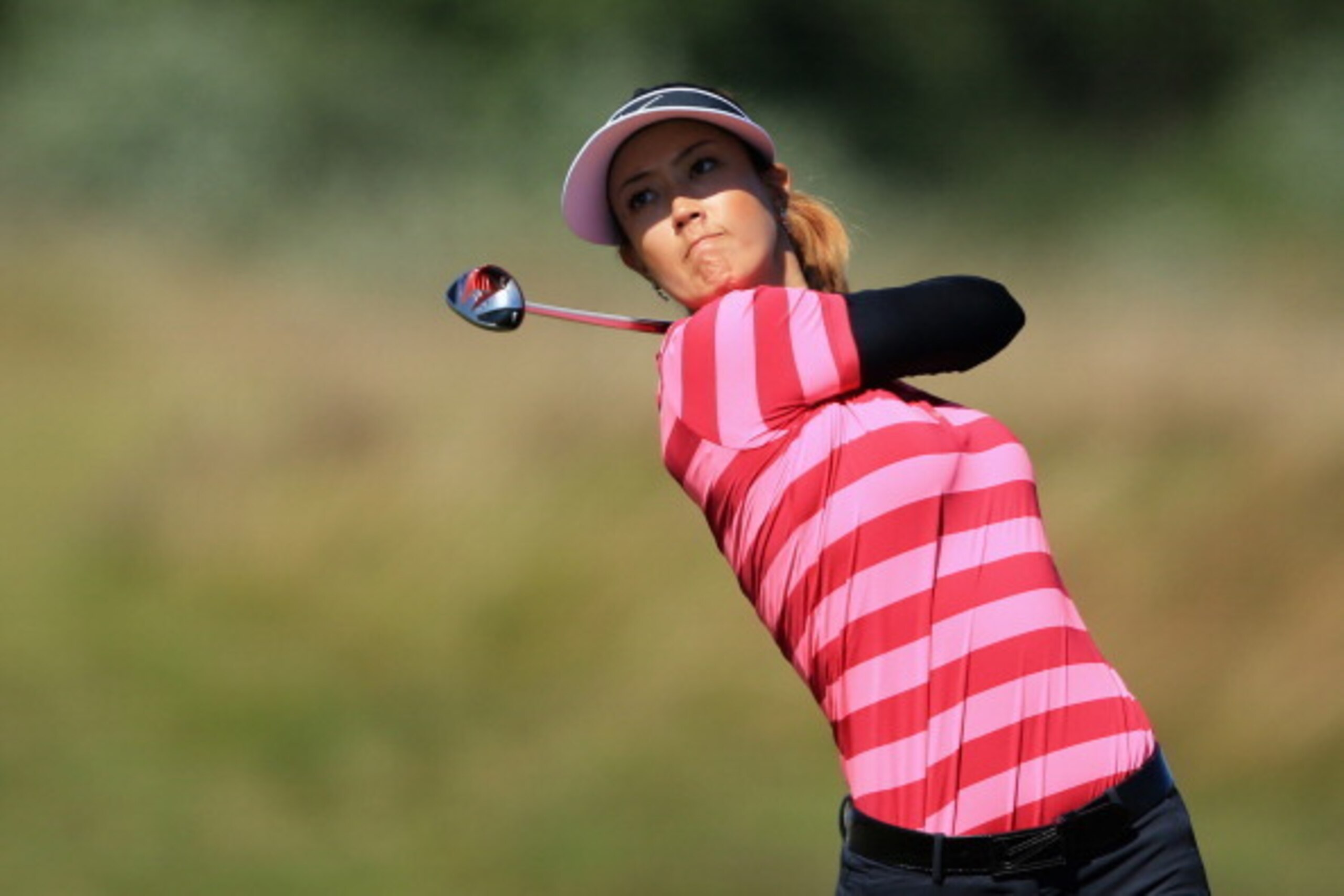 SOUTHPORT, ENGLAND - JULY 11:  Michelle Wie of the United States hits her 2nd shot on the 15th hole during the second round of the Ricoh Women's British Open at Royal Birkdale on July 11, 2014 in Southport, England.  (Photo by David Cannon/Getty Images)