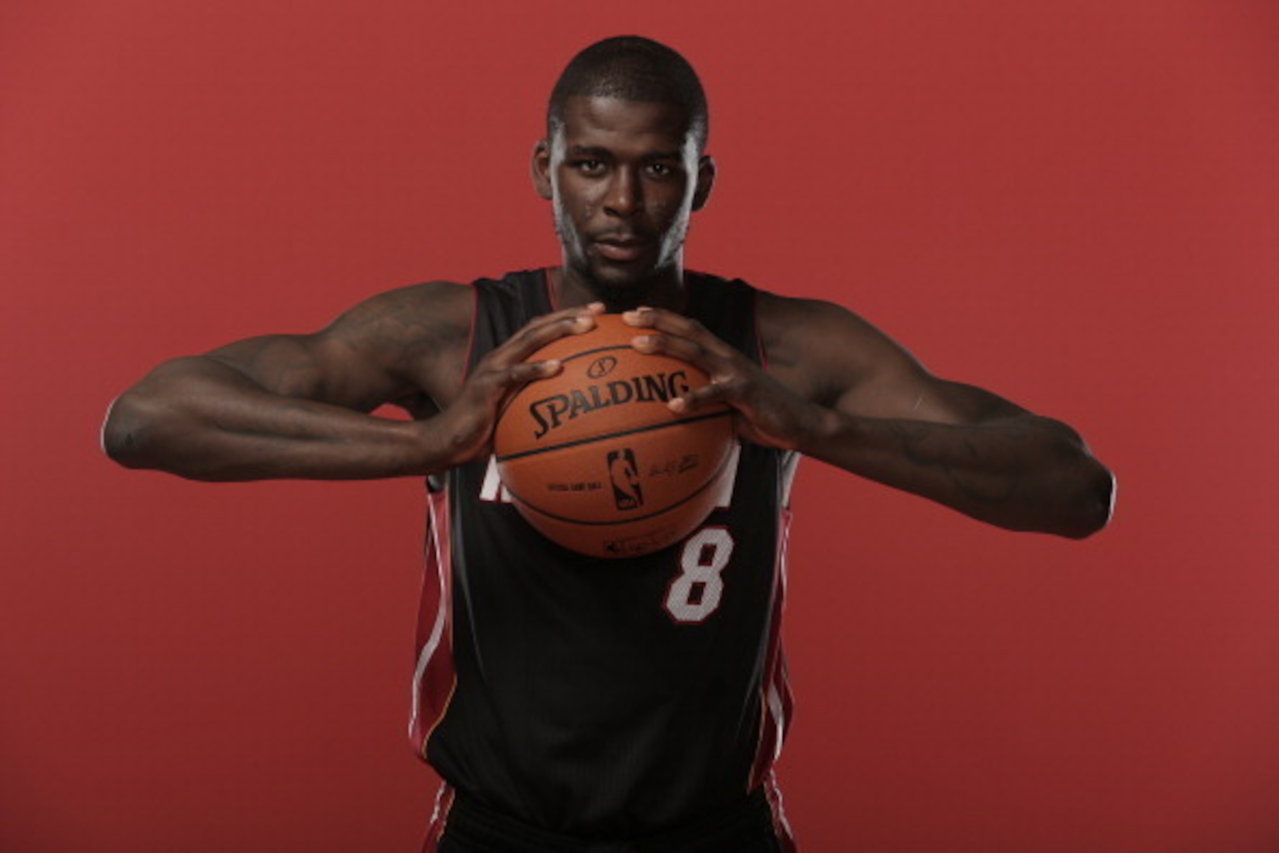 TARRYTOWN, NY - AUGUST 6: James Ennis #8 of the Miami Heat  poses for a portrait during the 2013 NBA rookie photo shoot on August 6, 2013 at the Madison Square Garden Training Facility in Tarrytown, New York. NOTE TO USER: User expressly acknowledges and 