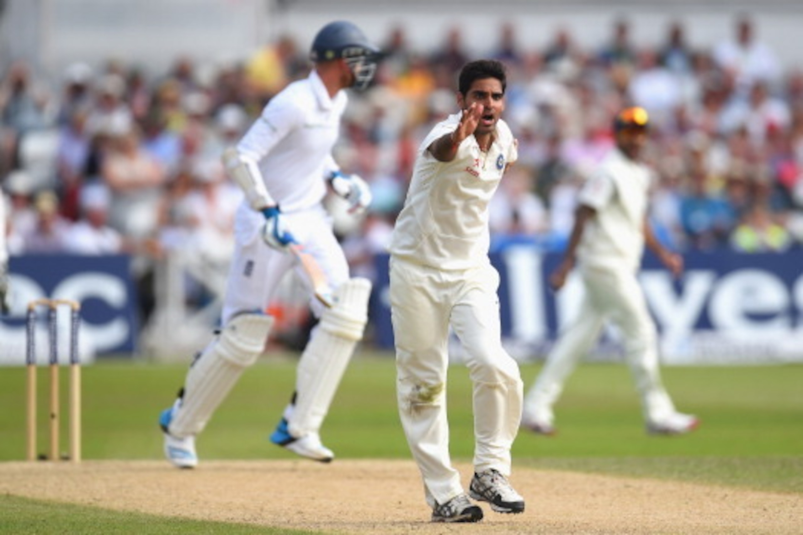 NOTTINGHAM, ENGLAND - JULY 11:  India bowler Bhuvneshwar Kumar appeals with success for the wicket of Stuart Broad during day three of the 1st  Investec Test Match between England and India at  Trent Bridge on July 11, 2014 in Nottingham, England.  (Photo
