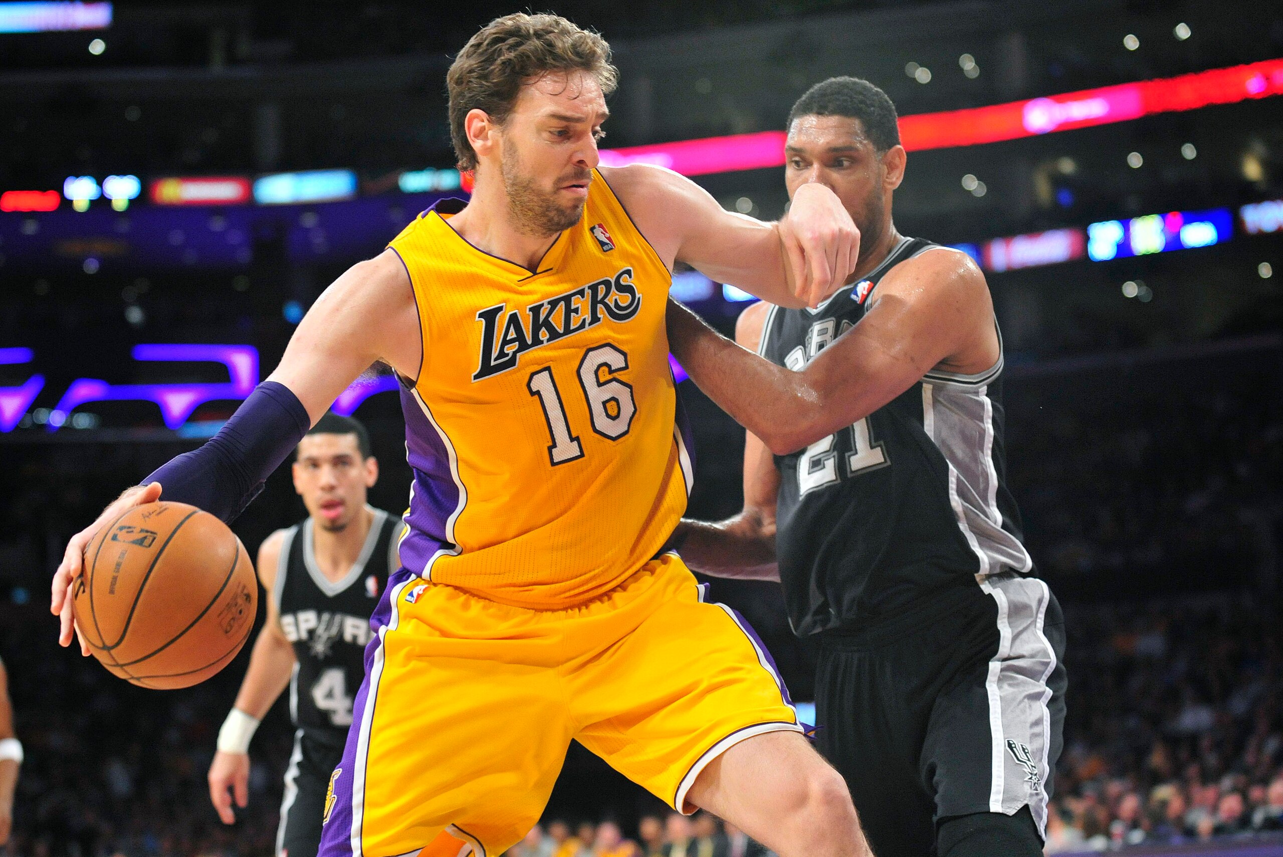 March 19, 2014; Los Angeles, CA, USA; Los Angeles Lakers center Pau Gasol (16) moves to the basket against the San Antonio Spurs during the first half at Staples Center. Mandatory Credit: Gary A. Vasquez-USA TODAY Sports