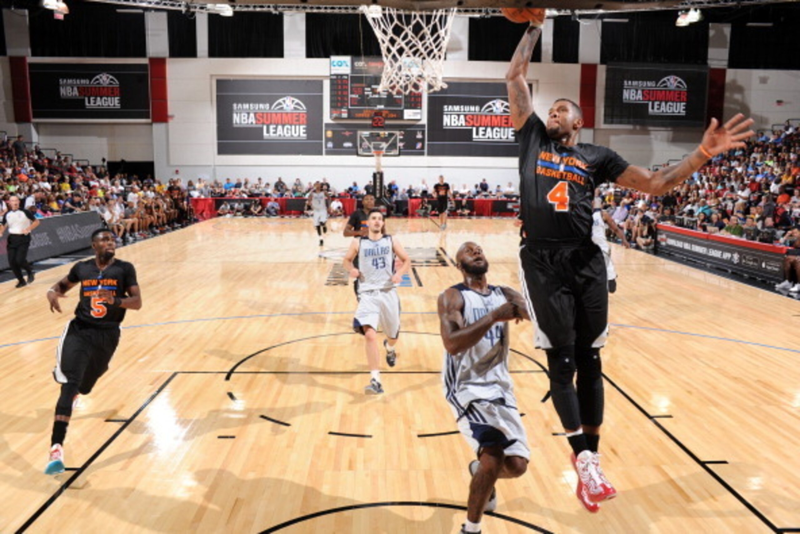 LAS VEGAS, NV - JULY 11: Jeremy Tyler #4 of the New York Knicks drives to the basket against the Dallas Mavericks during the game on July 11, 2014 at Cox Pavilion in Las Vegas, Nevada. NOTE TO USER: User expressly acknowledges and agrees that, by download