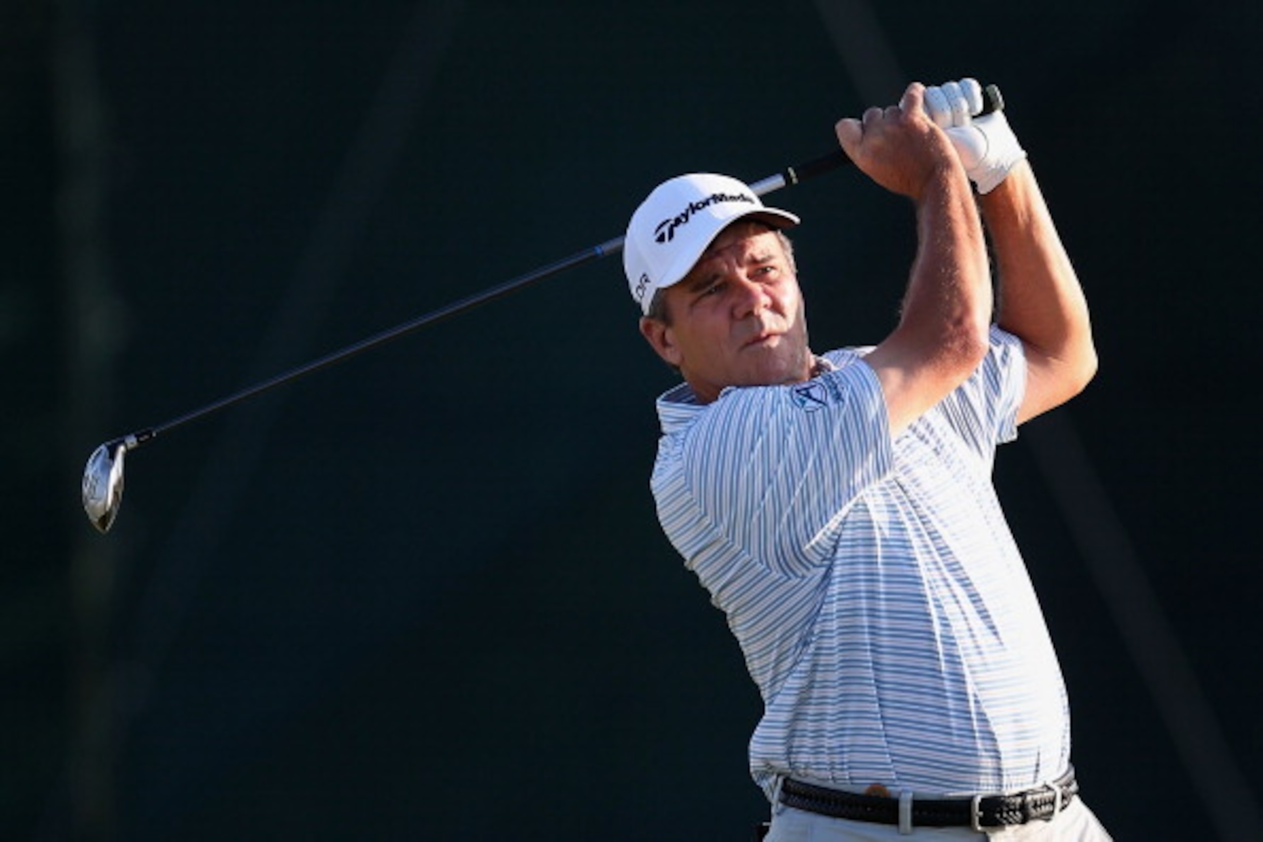 EDMOND, OK - JULY 11:  Scott Dunlap hits a tee shot on the 11th hole during the second round of the 2014 U.S. Senior Open Championship at Oak Tree National on July 11, 2014 in Edmond, Oklahoma.  (Photo by Christian Petersen/Getty Images)