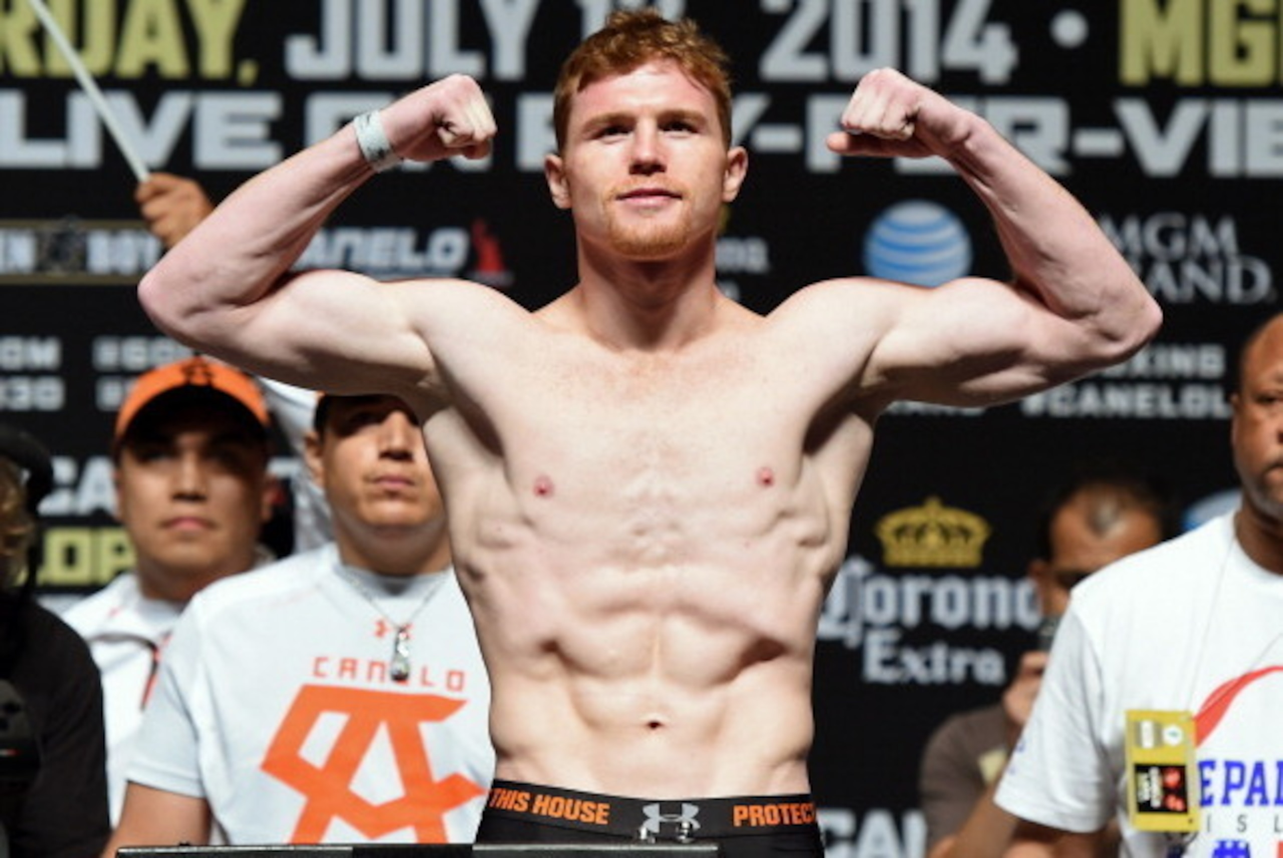LAS VEGAS, NV - JULY 11:  Boxer Canelo Alvarez poses on the scale during his official weigh-in at the MGM Grand Garden Arena on July 11, 2014 in Las Vegas, Nevada. Alvarez will meet Erislandy Lara in a non-title bout on July 12.  (Photo by Ethan Miller/Ge