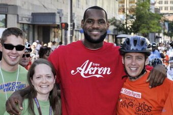 AKRON, OH - AUGUST 07:  LeBron James with volunteers during his 'King for Kids Bike-a-thon' on August 7, 2010, in Akron, Ohio. NOTE TO USER: User expressly acknowledges and agrees that, by downloading and/or using this Photograph, user is consenting to th