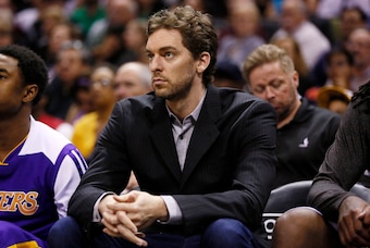 Apr 16, 2014; San Antonio, TX, USA; Los Angeles Lakers center Pau Gasol (16) watches from the bench against the San Antonio Spurs during the second half at AT&T Center. The Lakers won 113-100. Mandatory Credit: Soobum Im-USA TODAY Sports