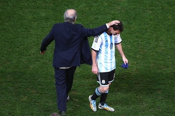 SAO PAULO, BRAZIL - JULY 09: Head coach Alejandro Sabella of Argentina reacts with Lionel Messi at the end of extra time during the 2014 FIFA World Cup Brazil Semi Final match between the Netherlands and Argentina at Arena de Sao Paulo on July 9, 2014 in SAO PAULO, BRAZIL - JULY 09: Head coach Alejandro Sabella of Argentina reacts with Lionel Messi at the end of extra time during the 2014 FIFA World Cup Brazil Semi Final match between the Netherlands and Argentina at Arena de Sao Paulo on July 9, 2014 in