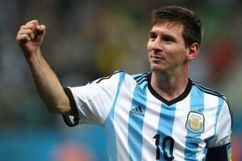 SAO PAULO, BRAZIL - JULY 09:  Lionel Messi of Argentina celebrates defeating the Netherlands in a shootout during the 2014 FIFA World Cup Brazil Semi Final match between the Netherlands and Argentina at Arena de Sao Paulo on July 9, 2014 in Sao Paulo, Bra