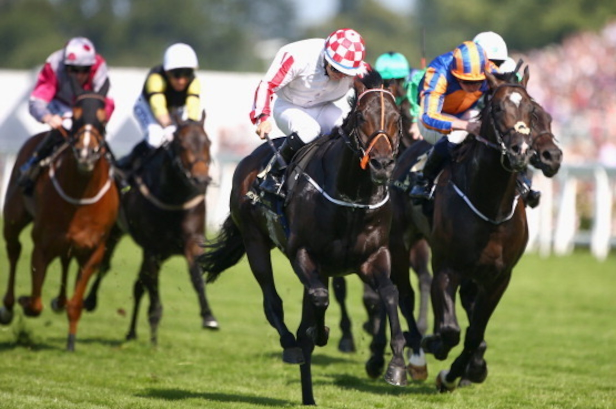 ASCOT, ENGLAND - JUNE 21:  Jockey Wayne Lordan riding Slade Power wins the Diamond Jubilee Stakes during day five of Royal Ascot at Ascot Racecourse on June 21, 2014 in Ascot, England.  (Photo by Charlie Crowhurst/Getty Images for Ascot Racecourse)