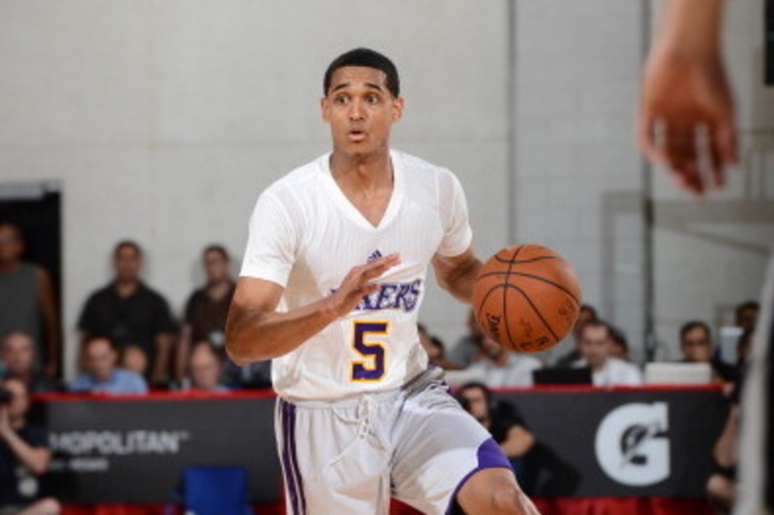 LAS VEGAS, NV - JULY 11: Jordan Clarkson #5 of the Los Angeles Lakers dribbles the ball against the Toronto Raptors during the game on July 11, 2014 at Cox Pavilion in Las Vegas, Nevada. NOTE TO USER: User expressly acknowledges and agrees that, by downlo
