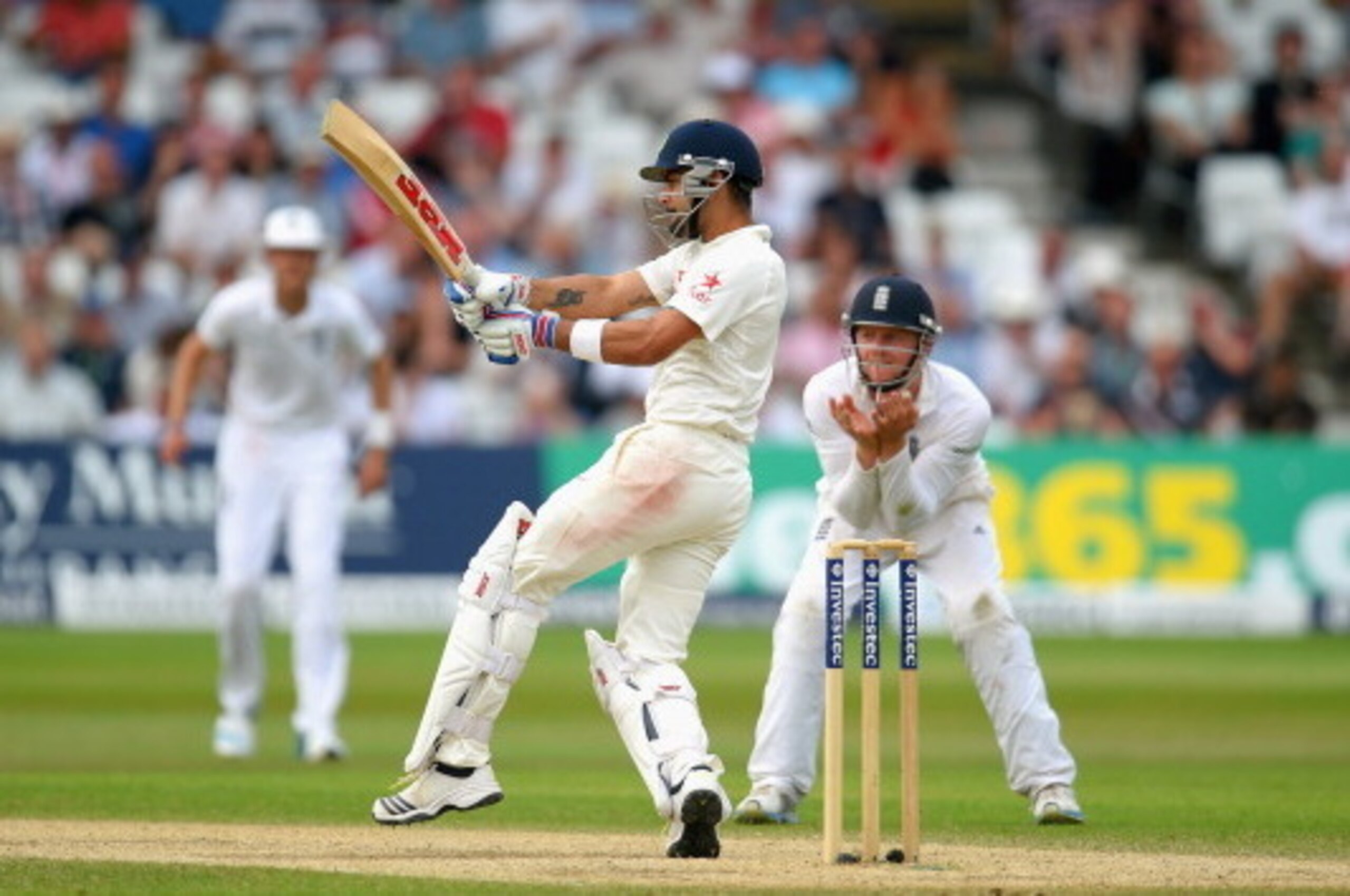 NOTTINGHAM, ENGLAND - JULY 12:  India batsman Virat Kohli pulls a ball towards the  boundary during day four of the 1st  Investec Test Match between England and India at  Trent Bridge on July 12, 2014 in Nottingham, England.  (Photo by Stu Forster/Getty I