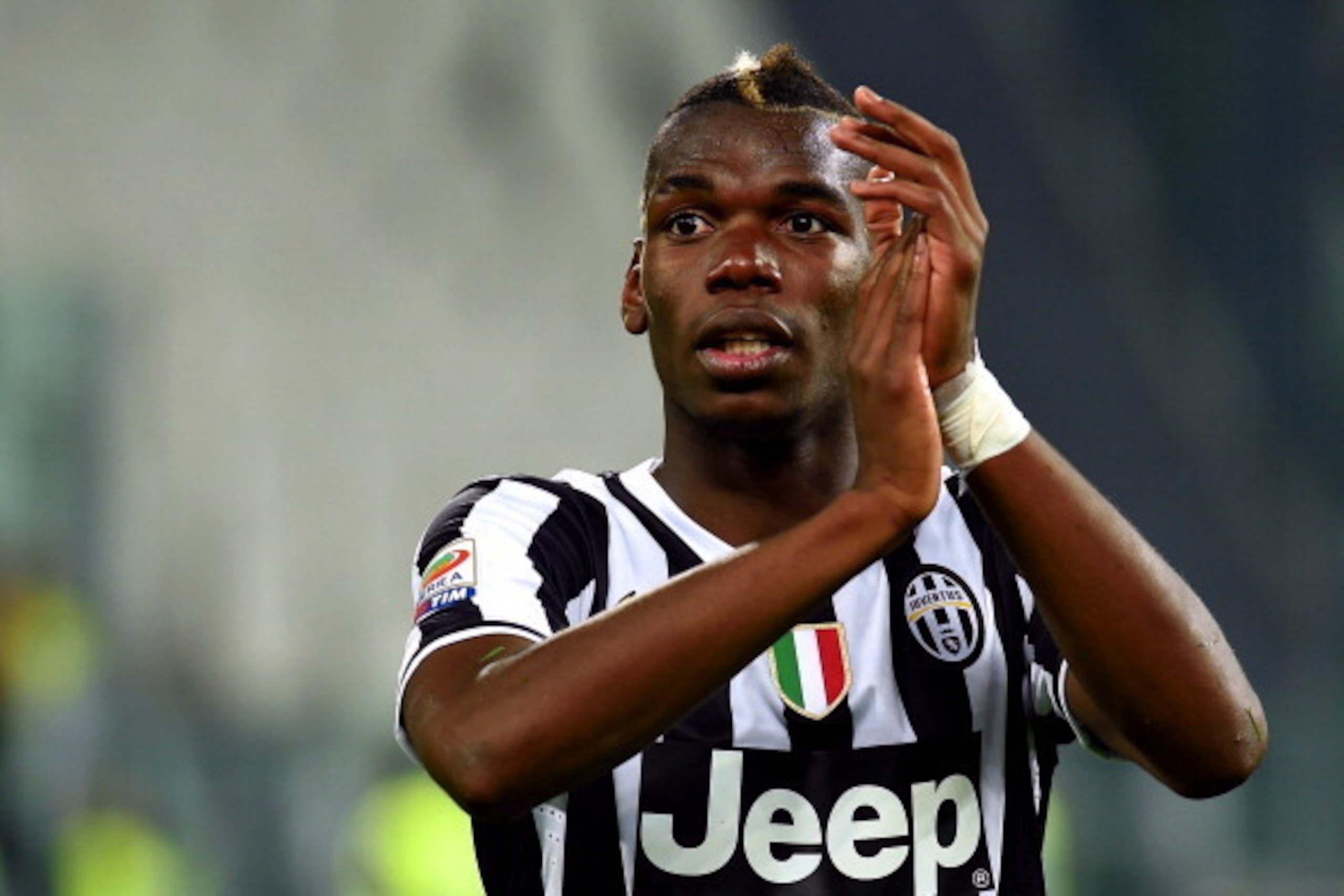 TURIN, ITALY - MAY 05:  Paul Pogba of Juventus celebrates after beating Atalanta BC 1-0 to win the Serie A Championships at the end of the Serie A match between Juventus and Atalanta BC at Juventus Arena on May 5, 2014 in Turin, Italy.  (Photo by Valerio 