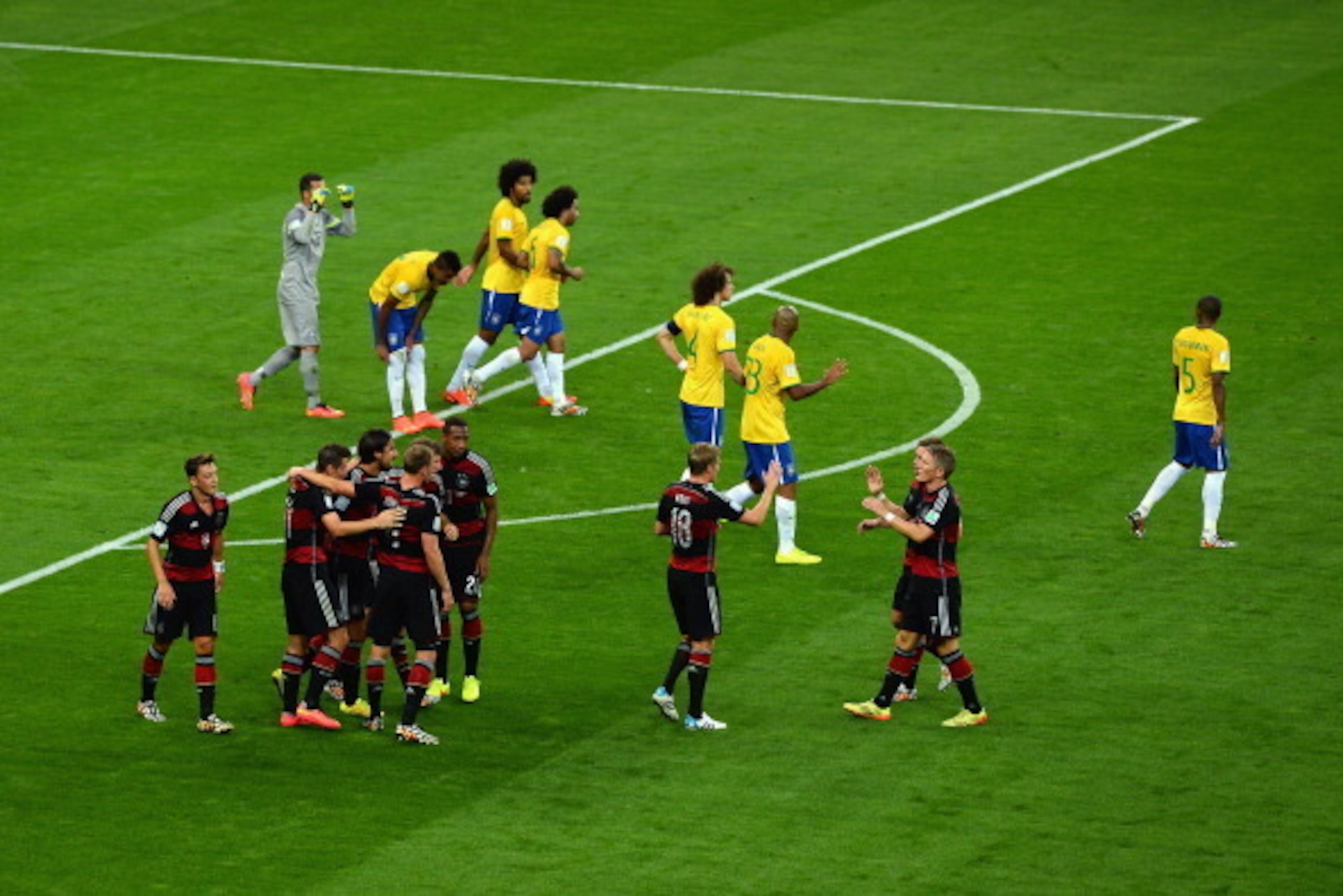 BELO HORIZONTE, BRAZIL - JULY 08:  Sami Khedira of Germany celebrates with his team-mates after scoring their fifth goal during the 2014 FIFA World Cup Brazil Semi Final match between Brazil and Germany at Estadio Mineirao on July 8, 2014 in Belo Horizont