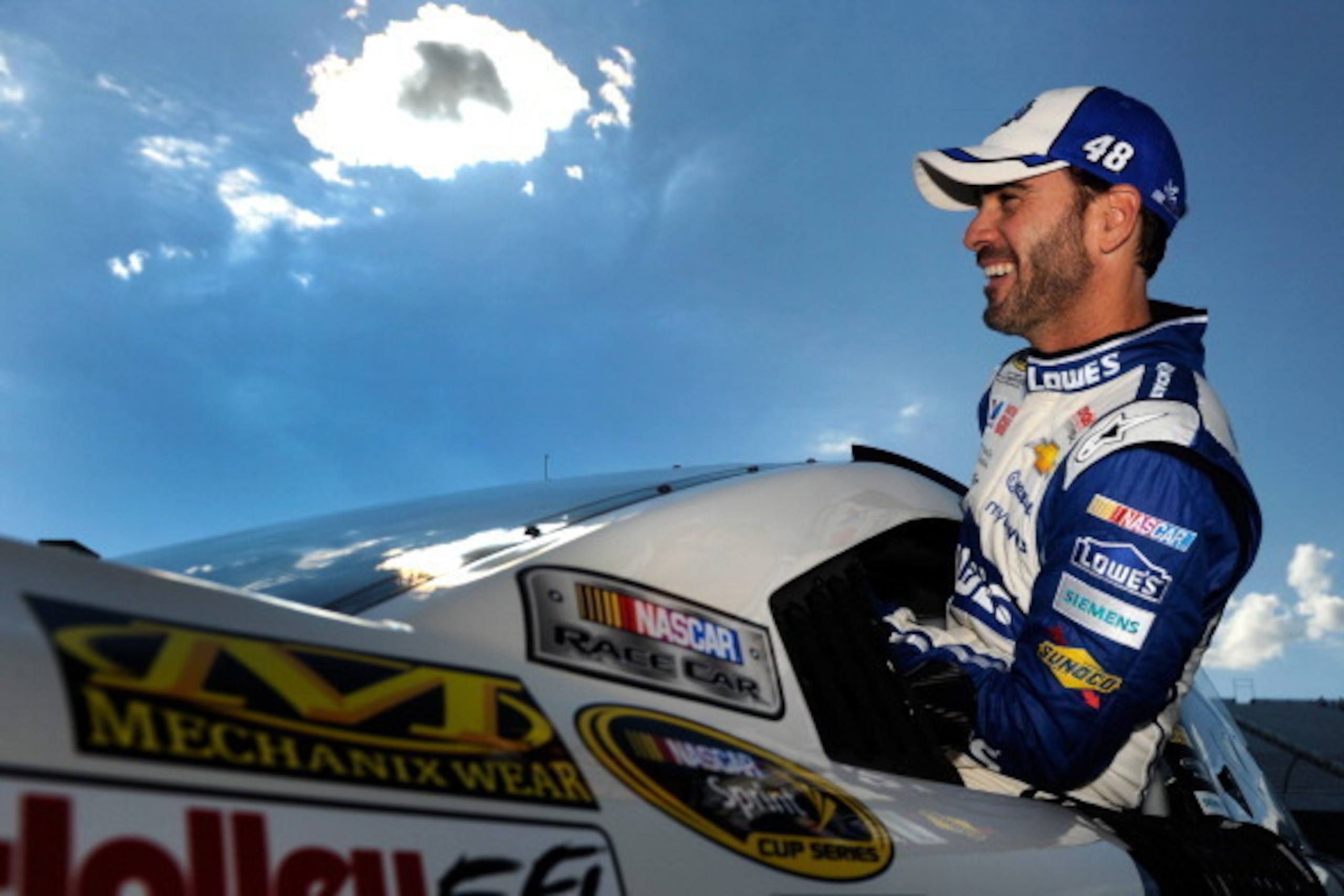 LOUDON, NH - JULY 11:  Jimmie Johnson, driver of the #48 Lowe's Chevrolet, looks on during qualifying for the NASCAR Sprint Cup Series Camping World RV Sales 301 at New Hampshire Motor Speedway on July 11, 2014 in Loudon, New Hampshire.  (Photo by Jared C