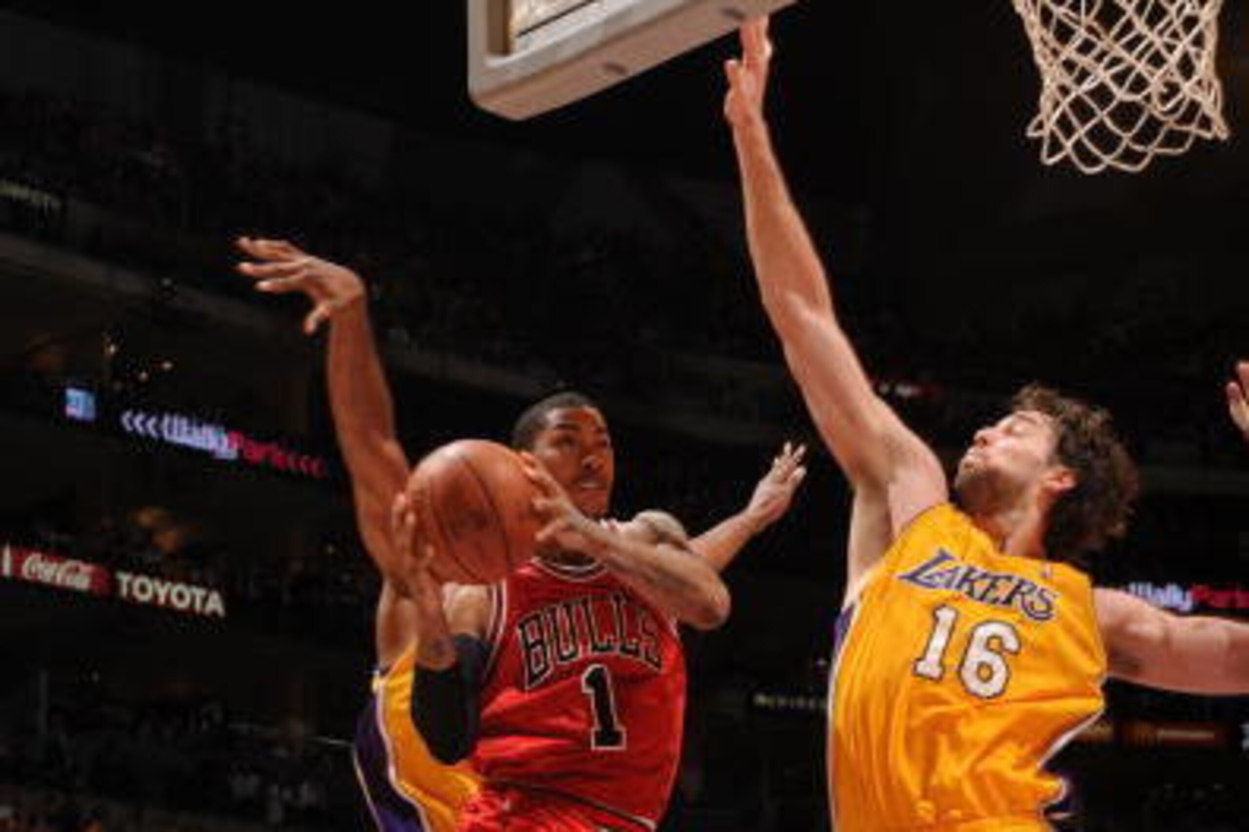 LOS ANGELES - NOVEMBER 19: Derrick Rose #1 of the Chicago Bulls puts up a shot against Pau Gasol #16 of the Los Angeles Lakers at Staples Center on November 19, 2009 in Los Angeles, California. NOTE TO USER: User expressly acknowledges and agrees that, b LOS ANGELES - NOVEMBER 19: Derrick Rose #1 of the Chicago Bulls puts up a shot against Pau Gasol #16 of the Los Angeles Lakers at Staples Center on November 19, 2009 in Los Angeles, California. NOTE TO USER: User expressly acknowledges and agrees that, b