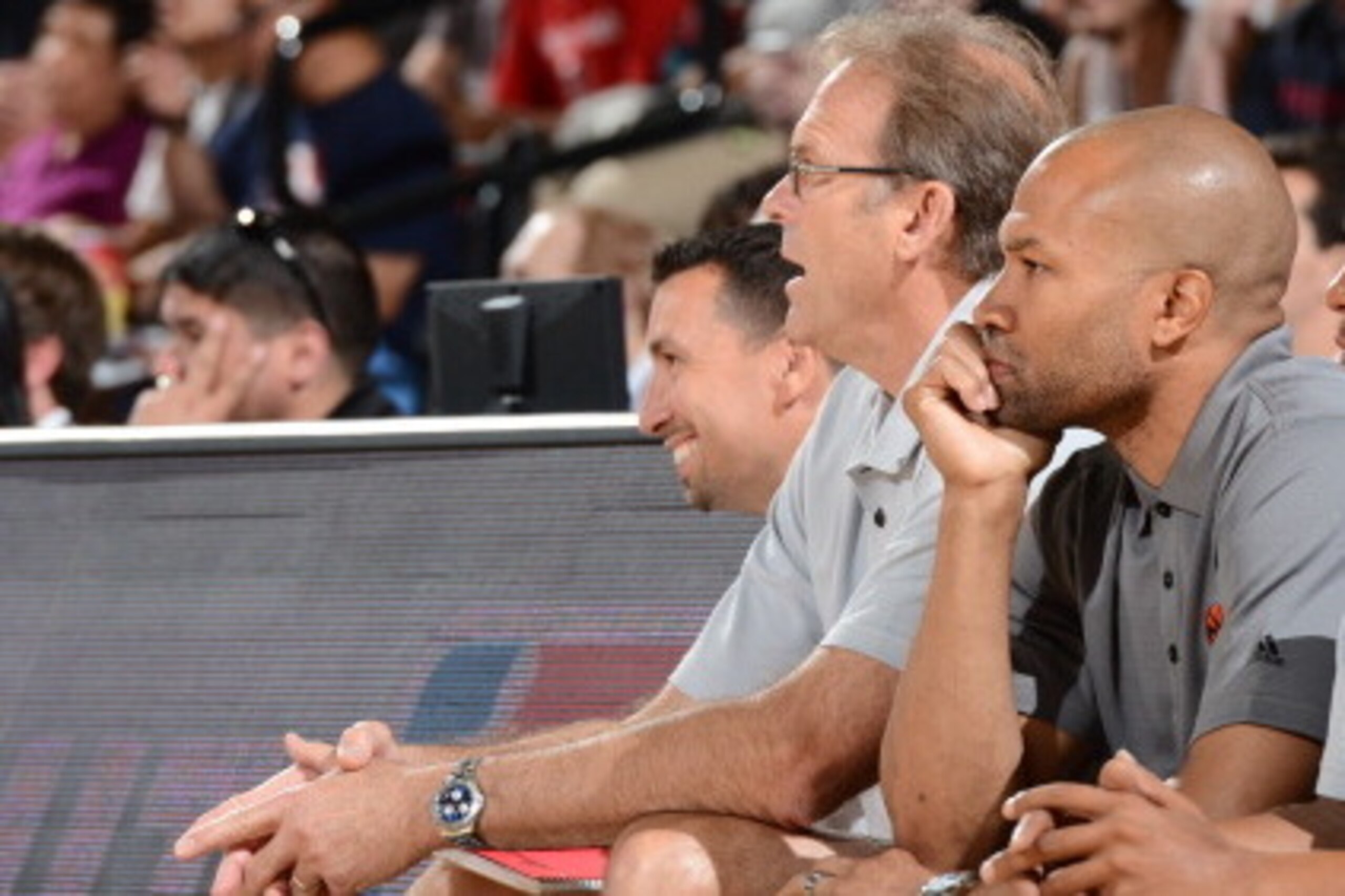 LAS VEGAS, NV - JULY 11: Head coach Derek Fisher, assistant coach Kurt Rambis, and assistant coach Rasheed Hazzard of the New York Knicks on the bench against the Dallas Mavericks during the game on July 11, 2014 at Cox Pavilion in Las Vegas, Nevada. NOTE
