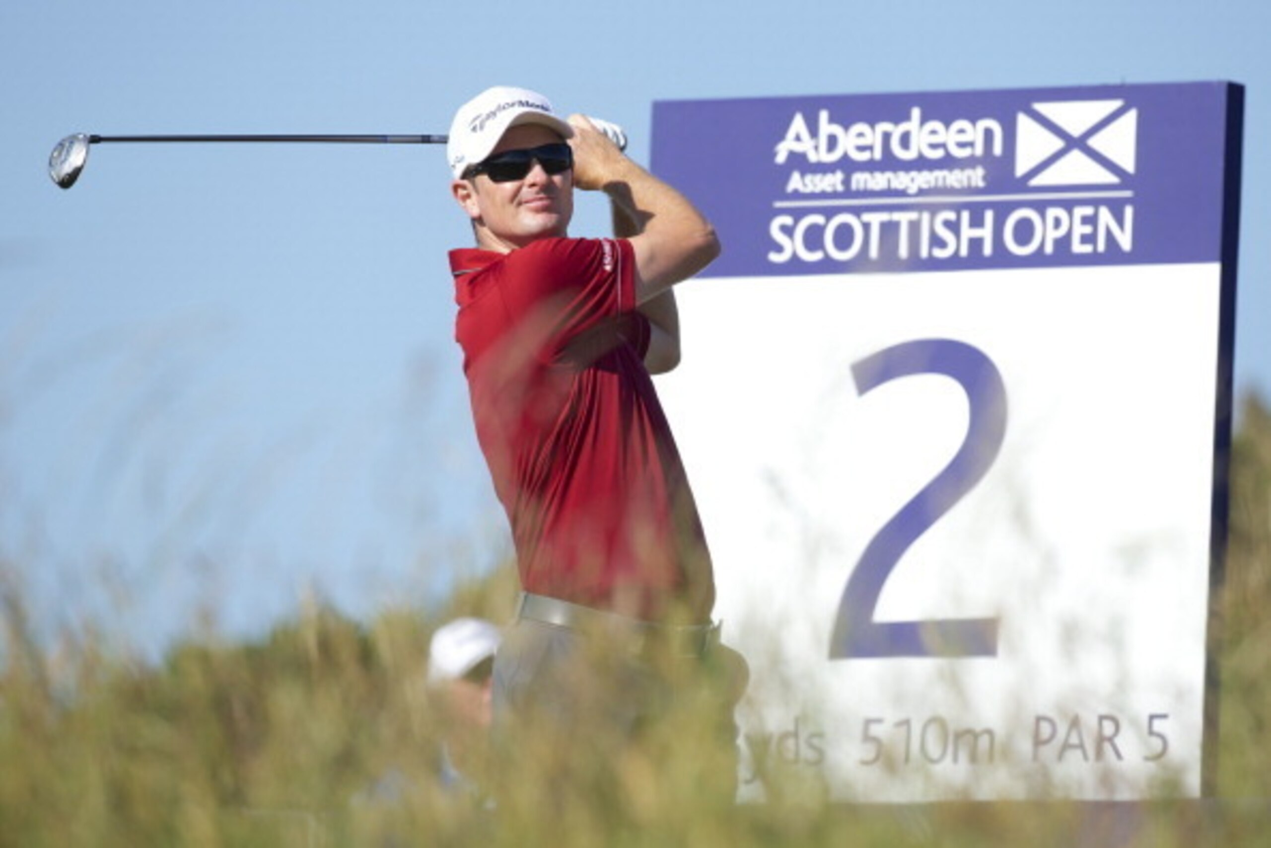 ABERDEEN, SCOTLAND - JULY 11:  Justin Rose of England tees off at Royal Aberdeen on July 11, 2014 in Aberdeen, Scotland.  (Photo by Paul Severn/Aberdeen Asset Management via Getty Images)