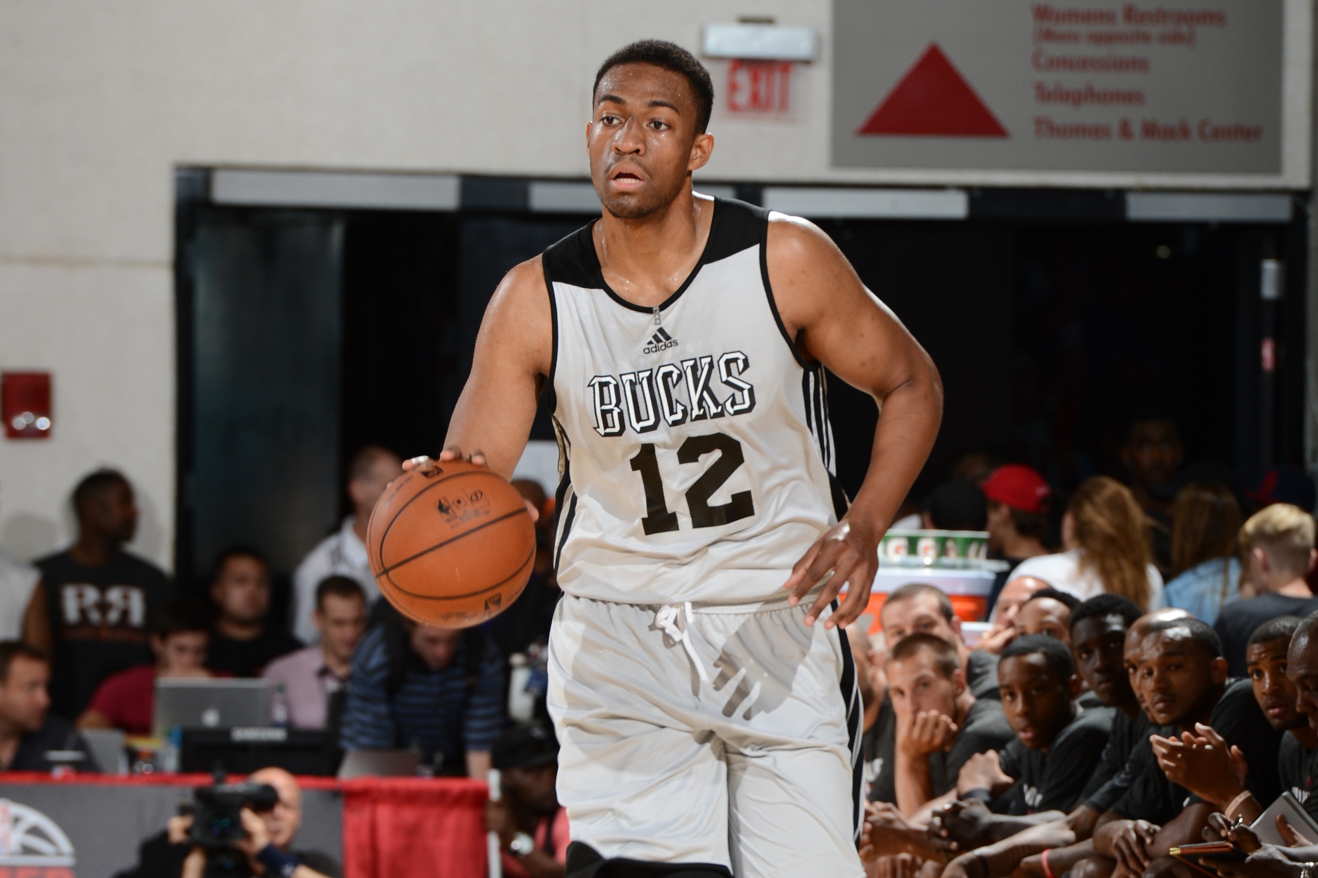 LAS VEGAS, NV - JULY 11: Jabari Parker #12 of the Milwaukee Bucks moves the ball up-court against the Cleveland Cavaliers on July 11, 2014 at Cox Pavilion in Las Vegas, Nevada. NOTE TO USER: User expressly acknowledges and agrees that, by downloading and LAS VEGAS, NV - JULY 11: Jabari Parker #12 of the Milwaukee Bucks moves the ball up-court against the Cleveland Cavaliers on July 11, 2014 at Cox Pavilion in Las Vegas, Nevada. NOTE TO USER: User expressly acknowledges and agrees that, by downloading and