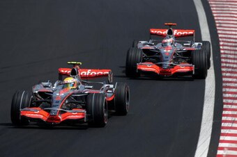 SAO PAULO, BRAZIL - OCTOBER 20:  Lewis Hamilton of Great Britain and McLaren Mercedes leads from team mate Fernando Alonso of Spain and McLaren Mercedes during qualifying for the Brazilian Formula One Grand Prix at the Autodromo Interlagos on October 20, 