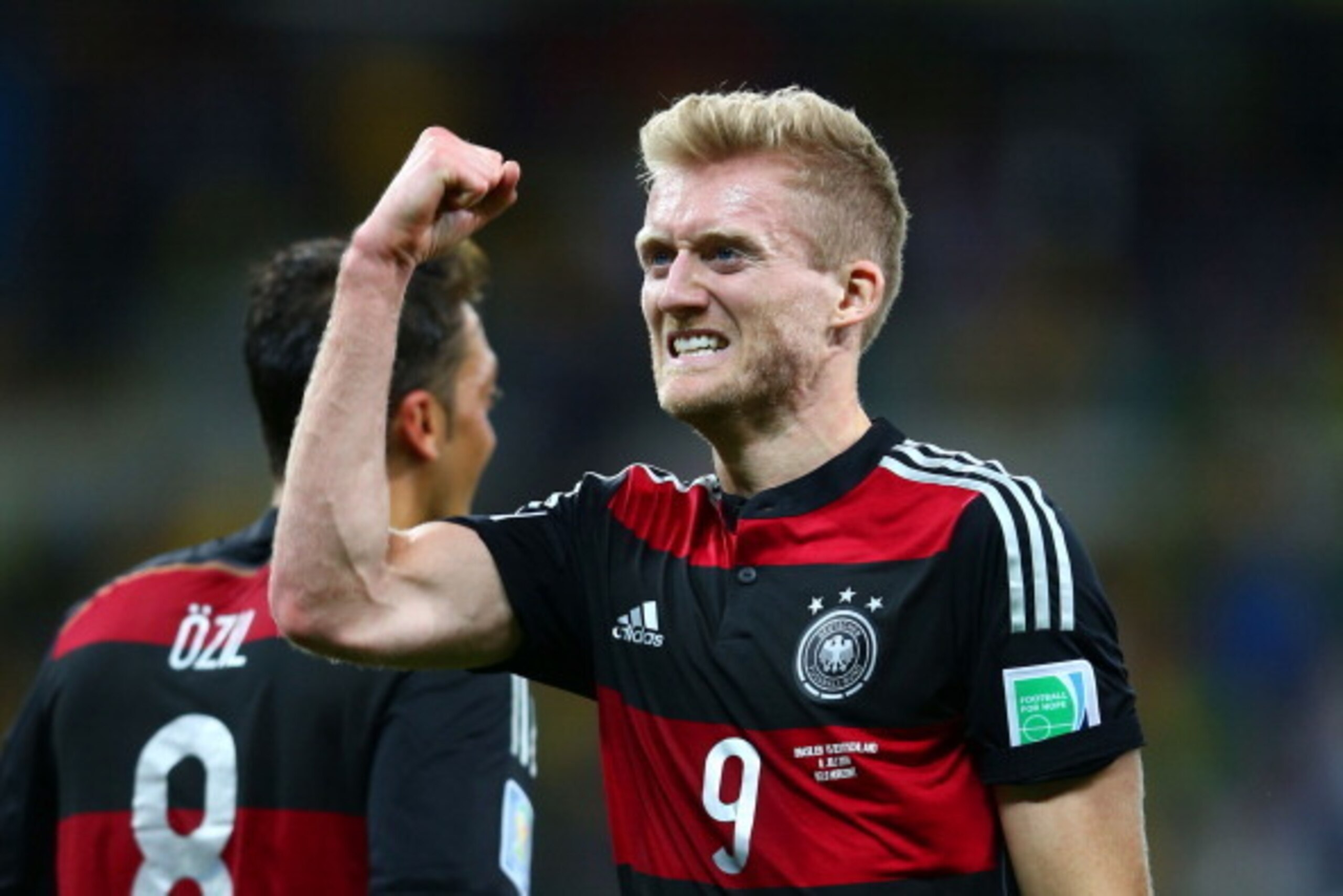BELO HORIZONTE, BRAZIL - JULY 08:  Andre Schuerrle of Germany celebrates scoring his team's seventh goal and his second of the game during the 2014 FIFA World Cup Brazil Semi Final match between Brazil and Germany at Estadio Mineirao on July 8, 2014 in Be
