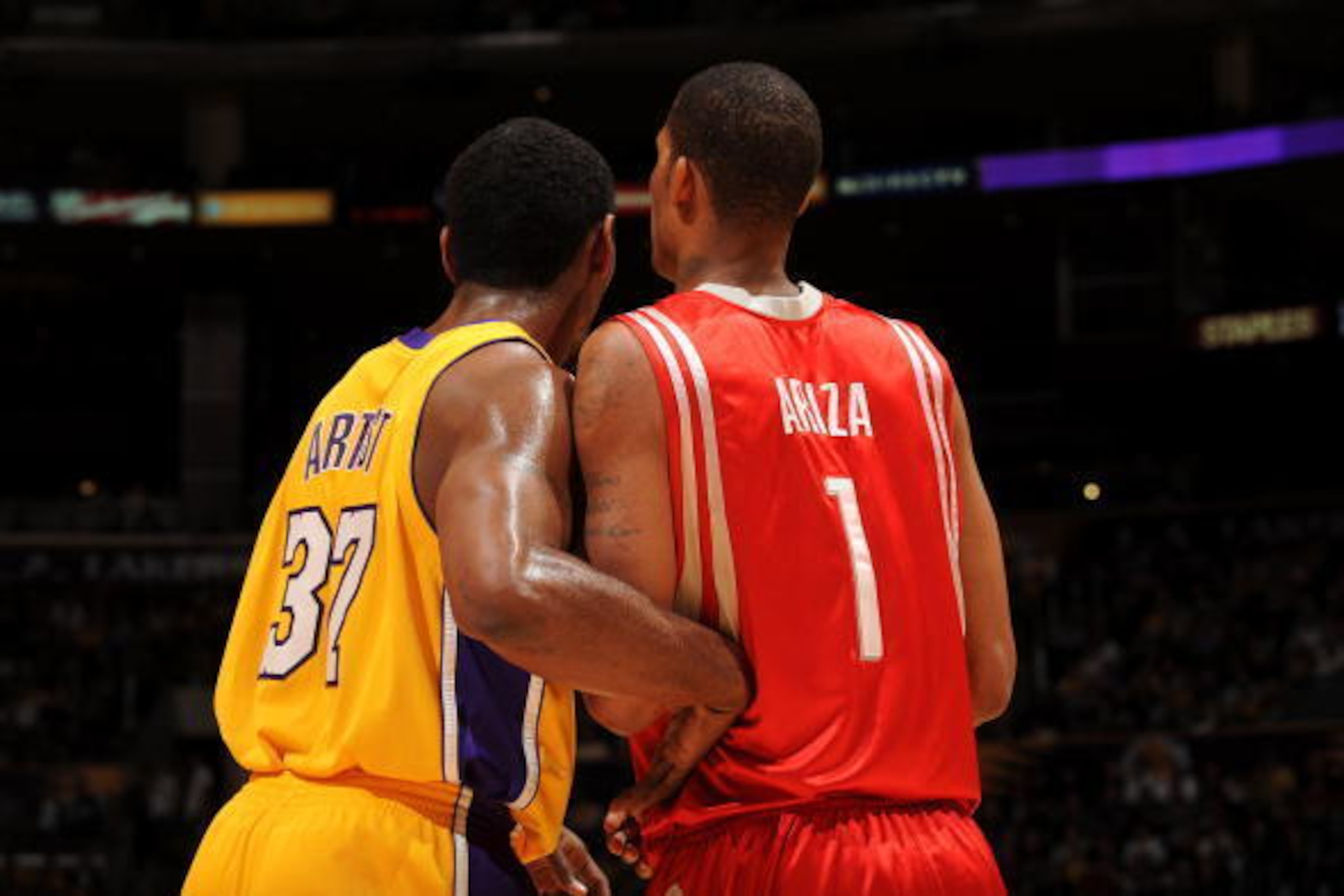 LOS ANGELES - JANUARY 5:  Ron Artest #37 of the Los Angeles Lakers defends against Trevor Ariza #1 of the Houston Rockets at Staples Center on January 5, 2010 in Los Angeles, California. NOTE TO USER: User expressly acknowledges and agrees that, by downlo