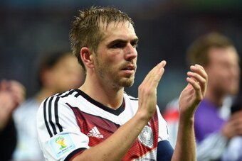 PORTO ALEGRE, BRAZIL - JUNE 30:  Philipp Lahm of Germany acknowledges the crowd after defeating Algeria 2-1 during the 2014 FIFA World Cup Brazil Round of 16 match between Germany and Algeria at Estadio Beira-Rio on June 30, 2014 in Porto Alegre, Brazil. 