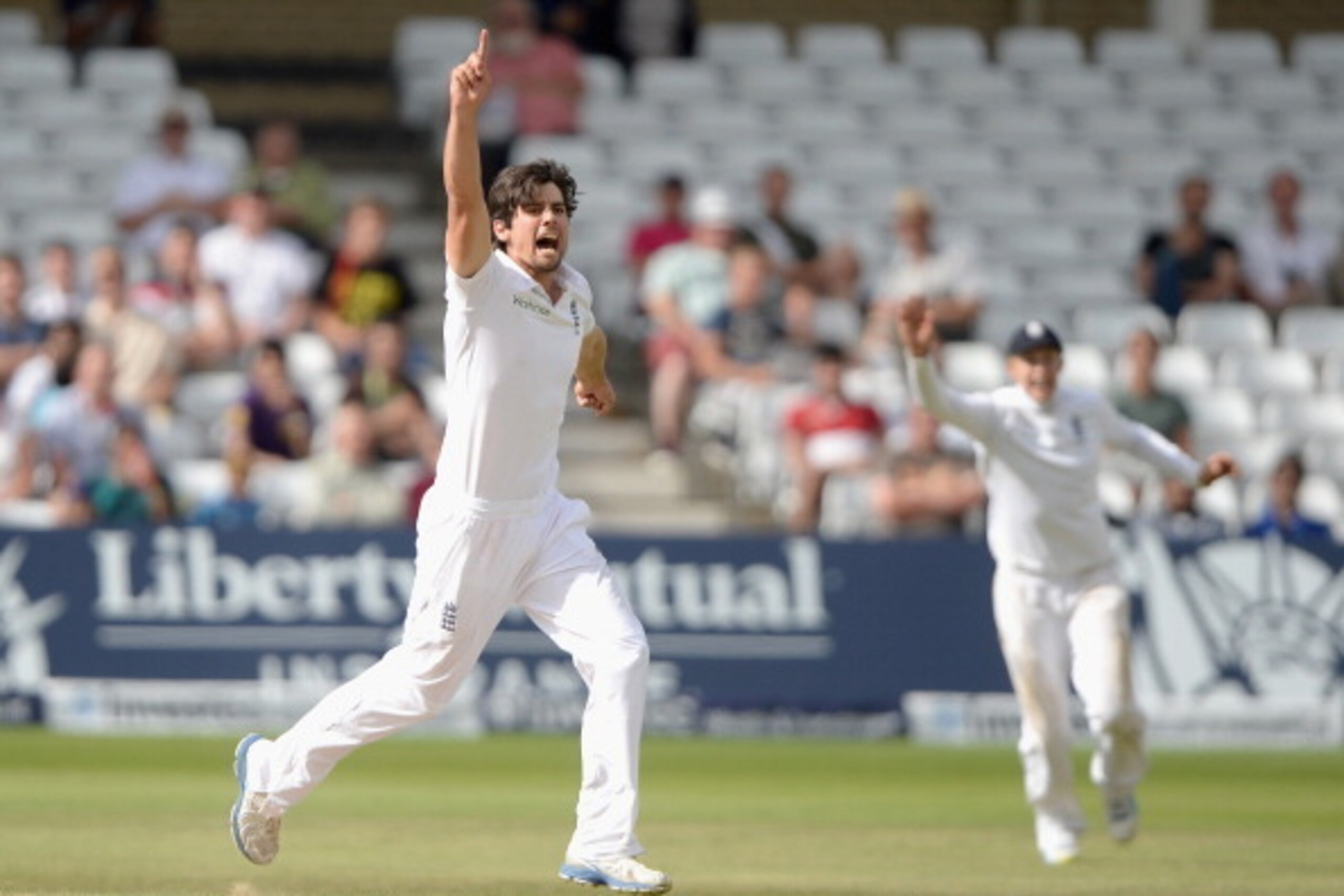 NOTTINGHAM, ENGLAND - JULY 13:  England captain Alastair Cook celebrates dismissing Ishant Sharma of India during day five of 1st Investec Test match between England and India at Trent Bridge on July 13, 2014 in Nottingham, England.  (Photo by Gareth Copl