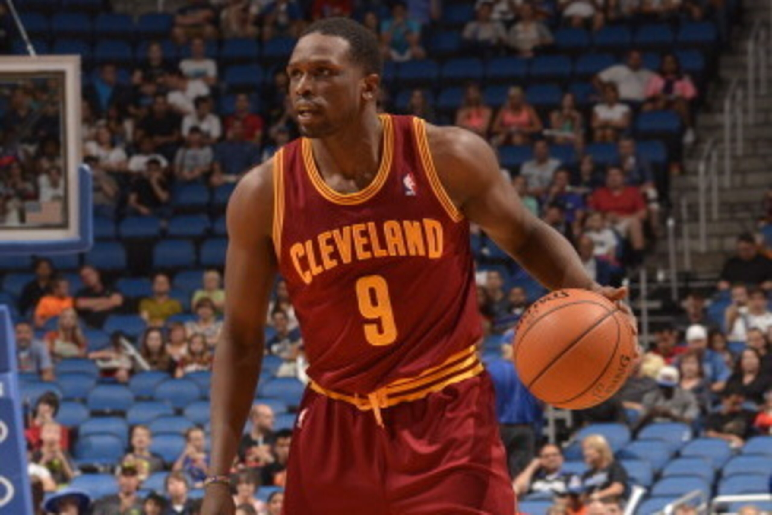 ORLANDO, FL - APRIL 2: Luol Deng #9 of the Cleveland Cavaliers looks to pass the ball against the Orlando Magic during the game on April 2, 2014 at Amway Center in Orlando, Florida. NOTE TO USER: User expressly acknowledges and agrees that, by downloading