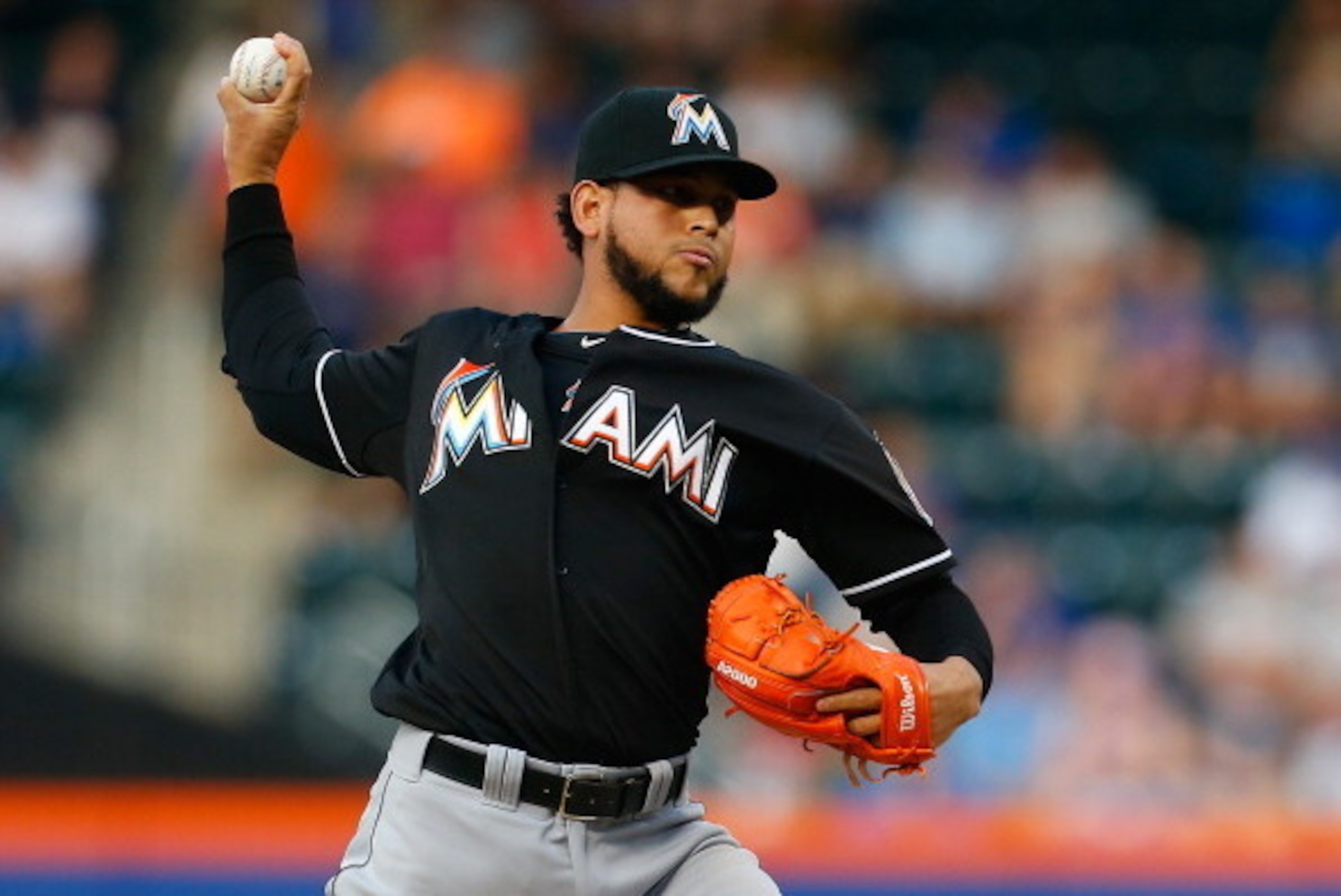 NEW YORK, NY - JULY 11:  Henderson Alvarez #37 of the Miami Marlins pitches in the first inning against the New York Mets at Citi Field on July 11, 2014 in the Flushing neighborhood of the Queens borough of New York City.  (Photo by Mike Stobe/Getty Image