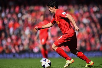 LIVERPOOL, ENGLAND - MAY 11:  Luis Suarez of Liverpool in action during the Barclays Premier League match between Liverpool and Newcastle United at Anfield on May 11, 2014 in Liverpool, England.  (Photo by Laurence Griffiths/Getty Images)