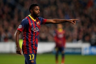 AMSTERDAM, NETHERLANDS - NOVEMBER 26:  Alex Song of Barcelona speaks to a team mate during the UEFA Champions League Group H match between Ajax Amsterdam and FC Barcelona at Amsterdam Arena on November 26, 2013 in Amsterdam, Netherlands.  (Photo by Dean M