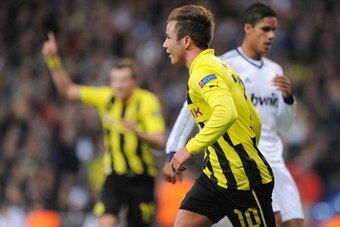 MADRID, SPAIN - NOVEMBER 06:  Mario Gotze of Borussia Dortmund celebrates after scoring Borussia's second goal during the UEFA Champions League Group D match between Real Madrid and Borussia Dortmund at Estadio Santiago Bernabeu on November 6, 2012 in Mad