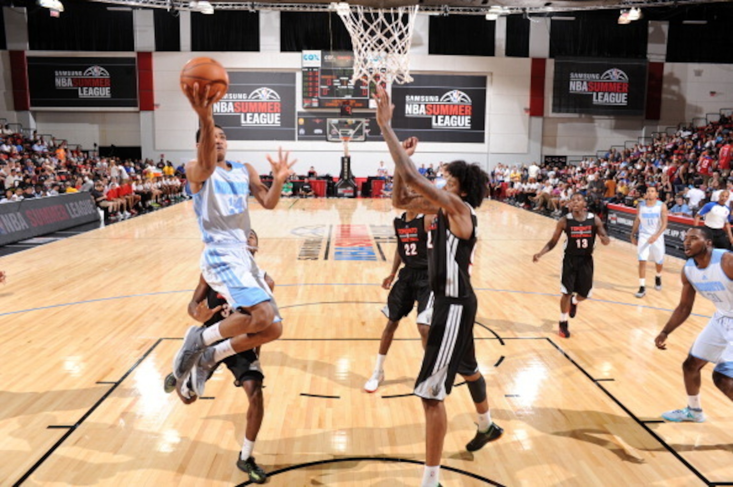 LAS VEGAS, NV - JULY 12: Gary Harris #14 of the Denver Nuggets goes up for a shot against the Toronto Raptors on July 12, 2014 at Cox Pavilion in Las Vegas, Nevada. NOTE TO USER: User expressly acknowledges and agrees that, by downloading and or using thi