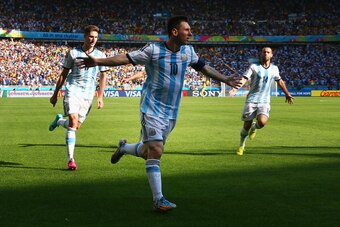 BELO HORIZONTE, BRAZIL - JUNE 21:  Lionel Messi of Argentina celebrates scoring his team's first goal during the 2014 FIFA World Cup Brazil Group F match between Argentina and Iran at Estadio Mineirao on June 21, 2014 in Belo Horizonte, Brazil.  (Photo by