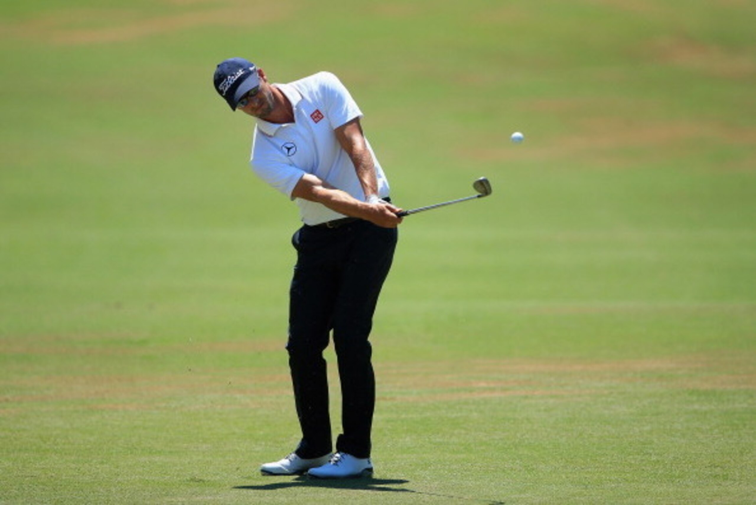 PINEHURST, NC - JUNE 15: Adam Scott of Australia hits his third shot on the fourth hole during the final round of the 114th U.S. Open at Pinehurst Resort & Country Club, Course No. 2 on June 15, 2014 in Pinehurst, North Carolina.  (Photo by David Cannon/G