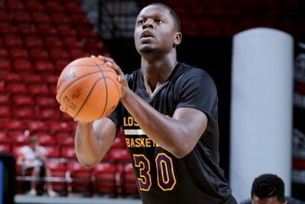 LAS VEGAS, NV - JULY 13: Julius Randle #30 of the Los Angeles Lakers attempts a free throw against the New Orleans Pelicans on July 13, 2014 at Thomas & Mack  in Las Vegas, Nevada. NOTE TO USER: User expressly acknowledges and agrees that, by downloading 