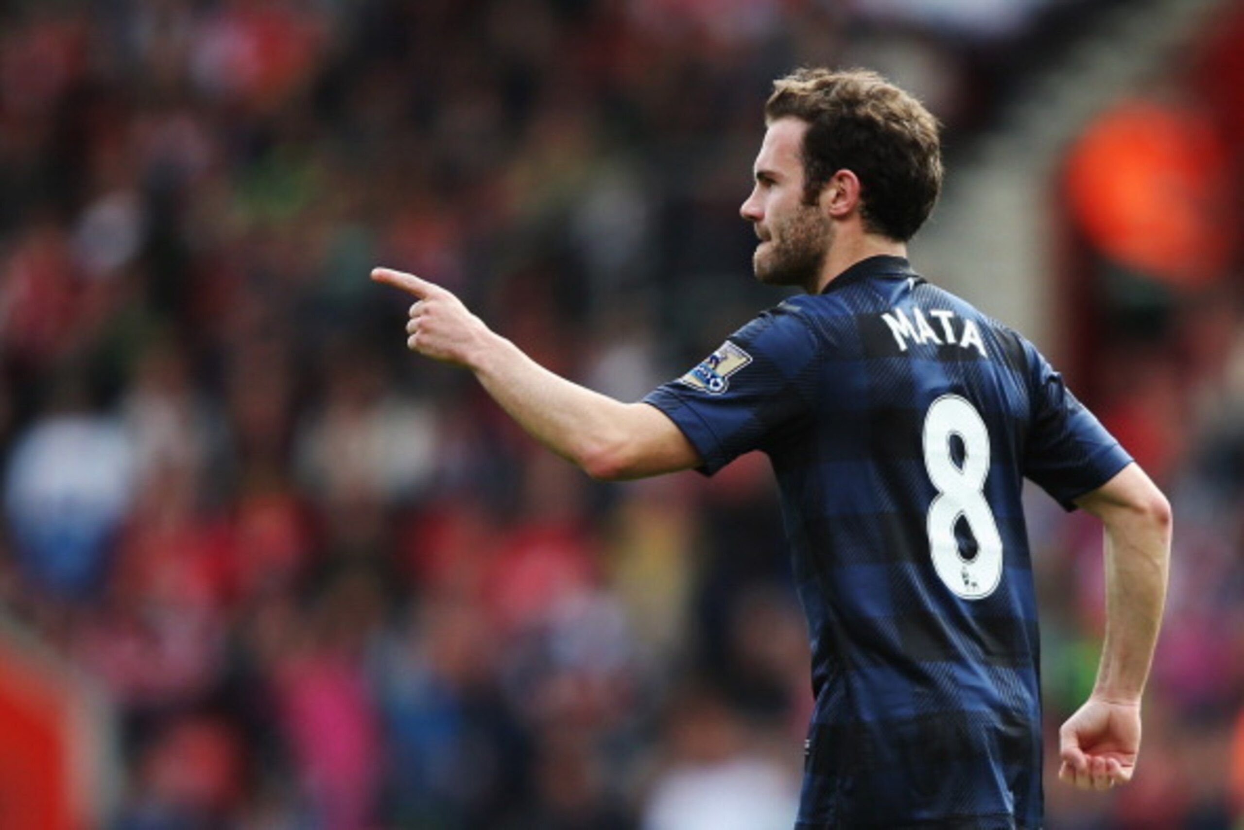 SOUTHAMPTON, ENGLAND - MAY 11:  Juan Mata of Manchester United celebrates scoring during the Barclays Premier League match between Southampton and Manchester United at St Mary's Stadium on May 11, 2014 in Southampton, England.  (Photo by Ian Walton/Getty 