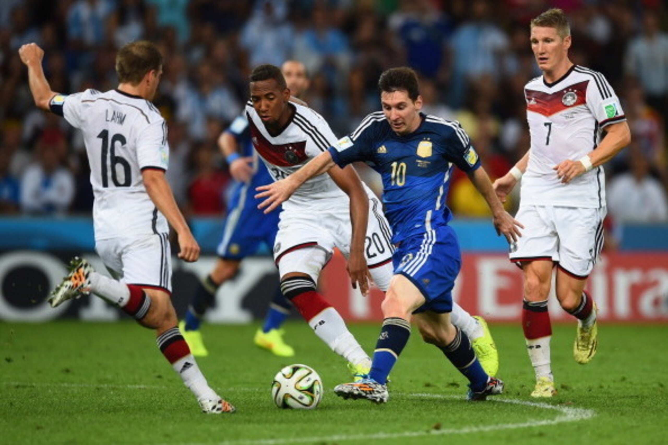 RIO DE JANEIRO, BRAZIL - JULY 13:  Lionel Messi of Argentina takes on (L-R) Philipp Lahm and Jerome Boateng Germany during the 2014 FIFA World Cup Brazil Final match between Germany and Argentina at Maracana on July 13, 2014 in Rio de Janeiro, Brazil.  (P